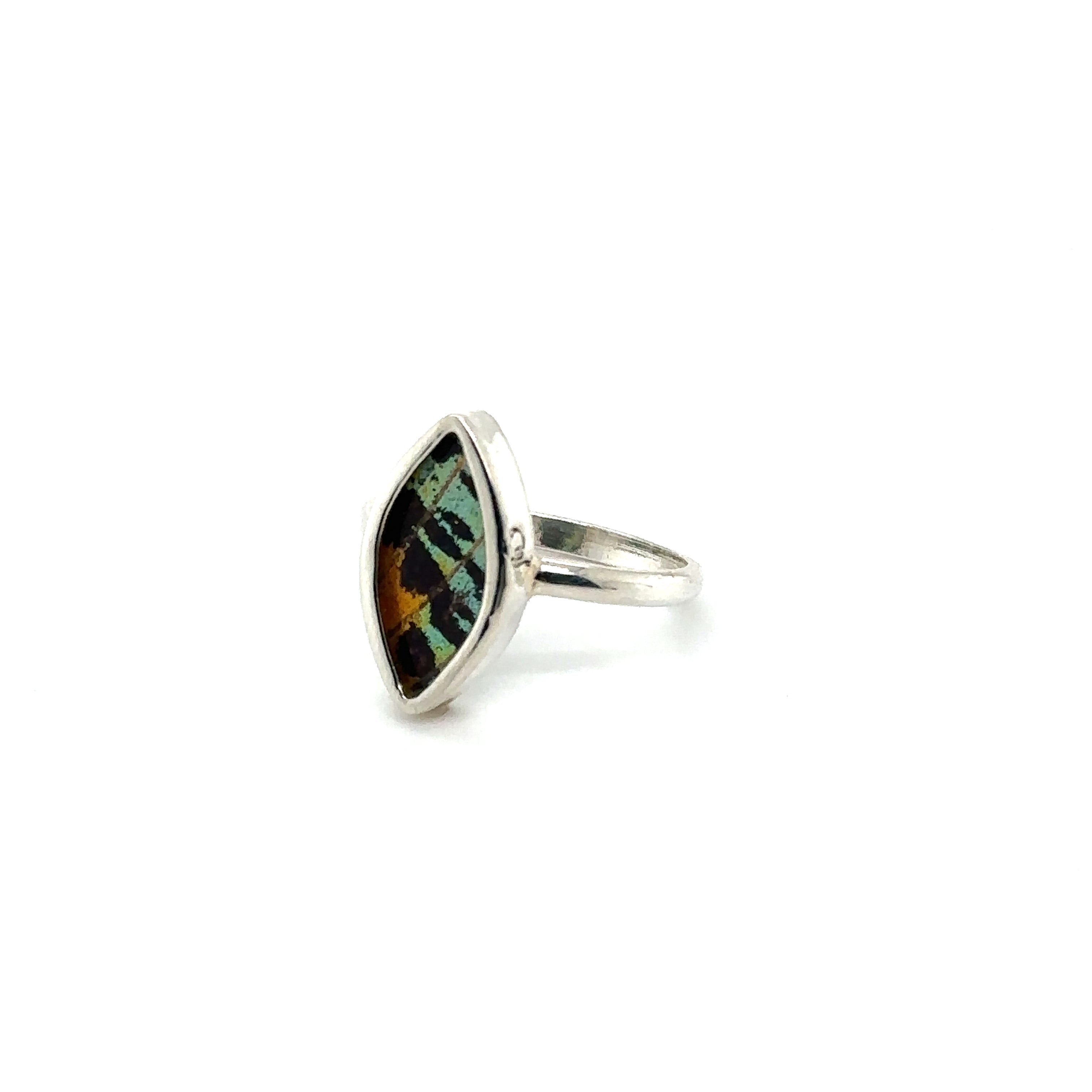 A Genuine Butterfly Wing Ring in Marquise Shape, a sustainable fashion silver ring with a black and green butterfly wing stone.