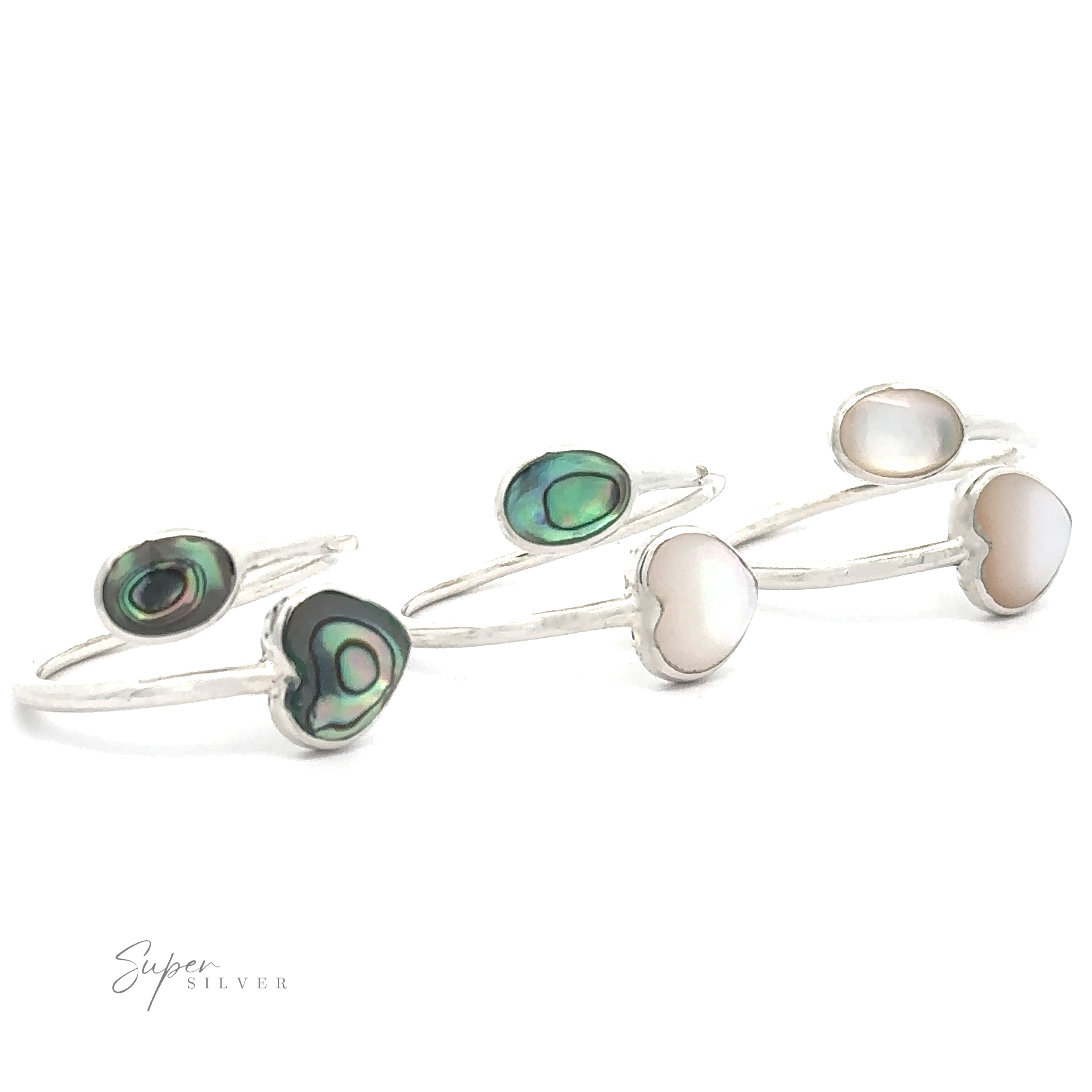 Adjustable Inlay Stone Heart Ring with Abalone and Mother of Pearl on a white background.