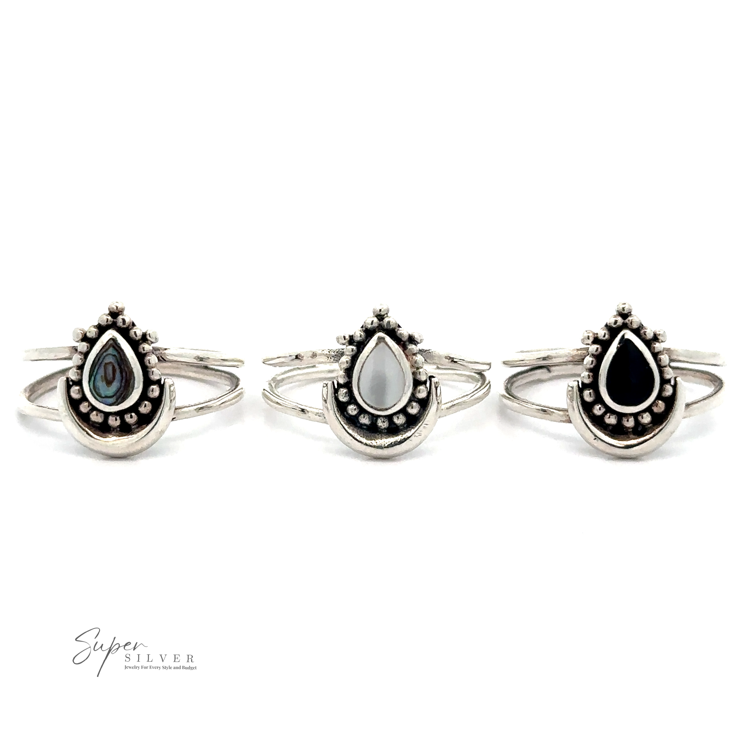 Three Teardrop Rings With Inlaid Stone and Crescent Moon (green, white, and black) displayed side by side on a white background, showcasing exquisite silverwork jewelry. Text "Super Silver" is in the bottom left corner.