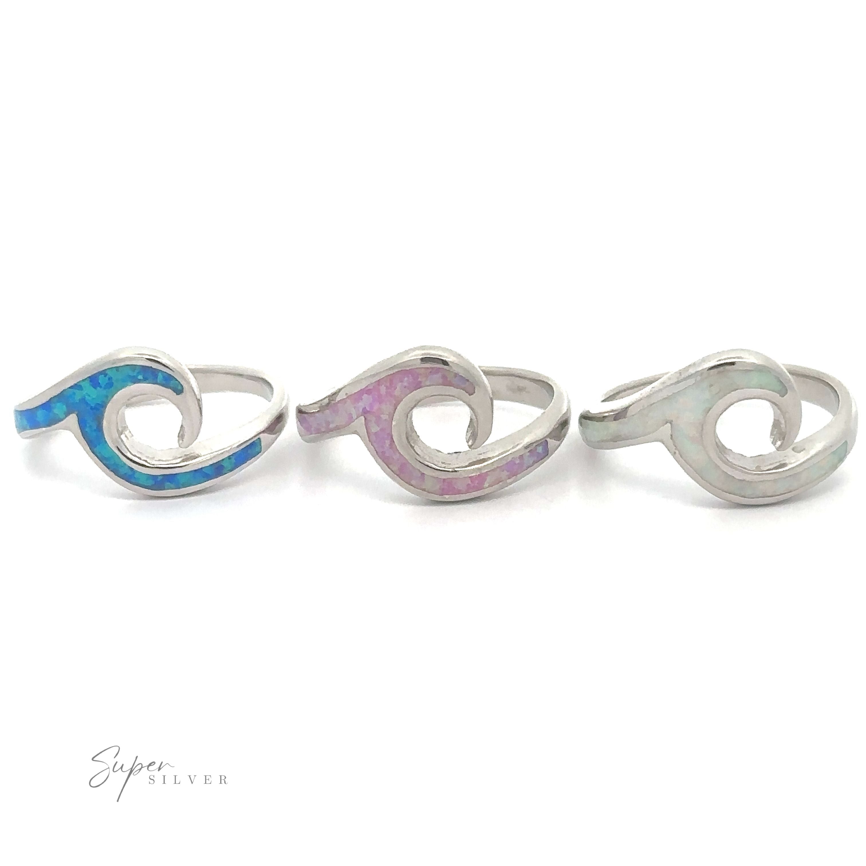 Three Lab-Created Opal Wave Bands with inlaid multicolored fire-opal accents.