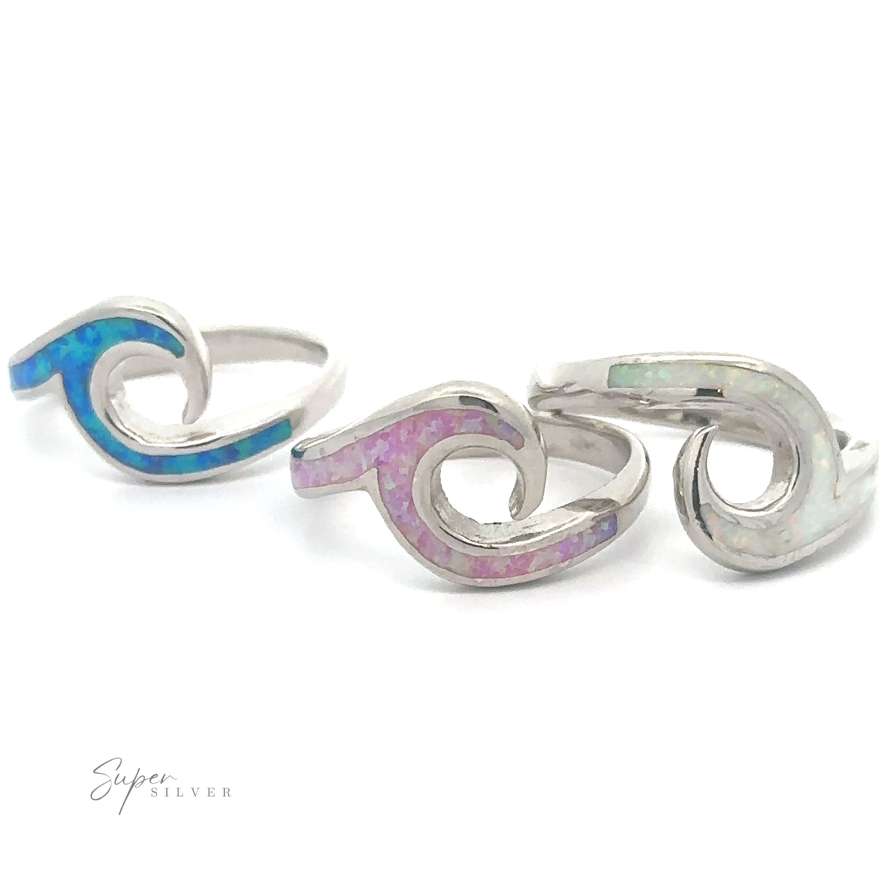 Three Lab-Created Opal Wave Bands on a white background.