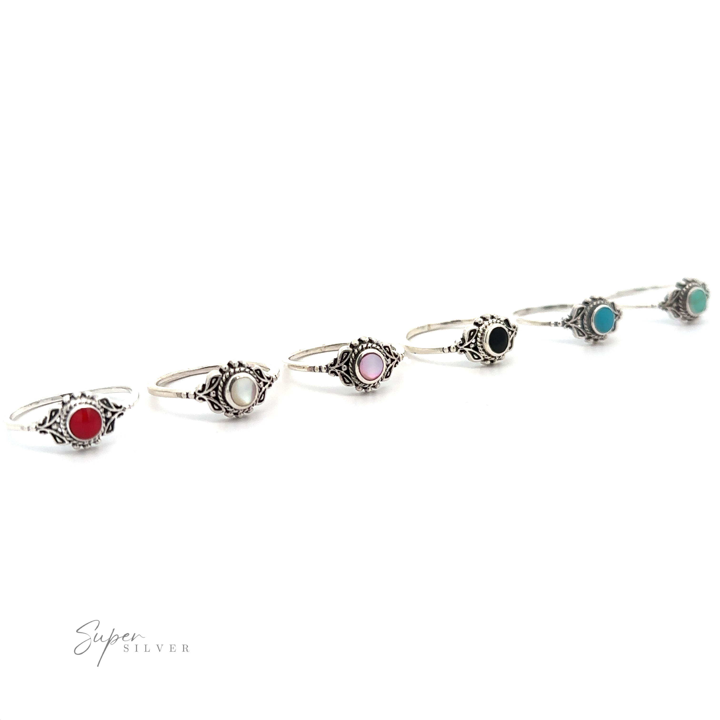 A row of Dainty Inlaid Stone Rings with Turquoise stones.