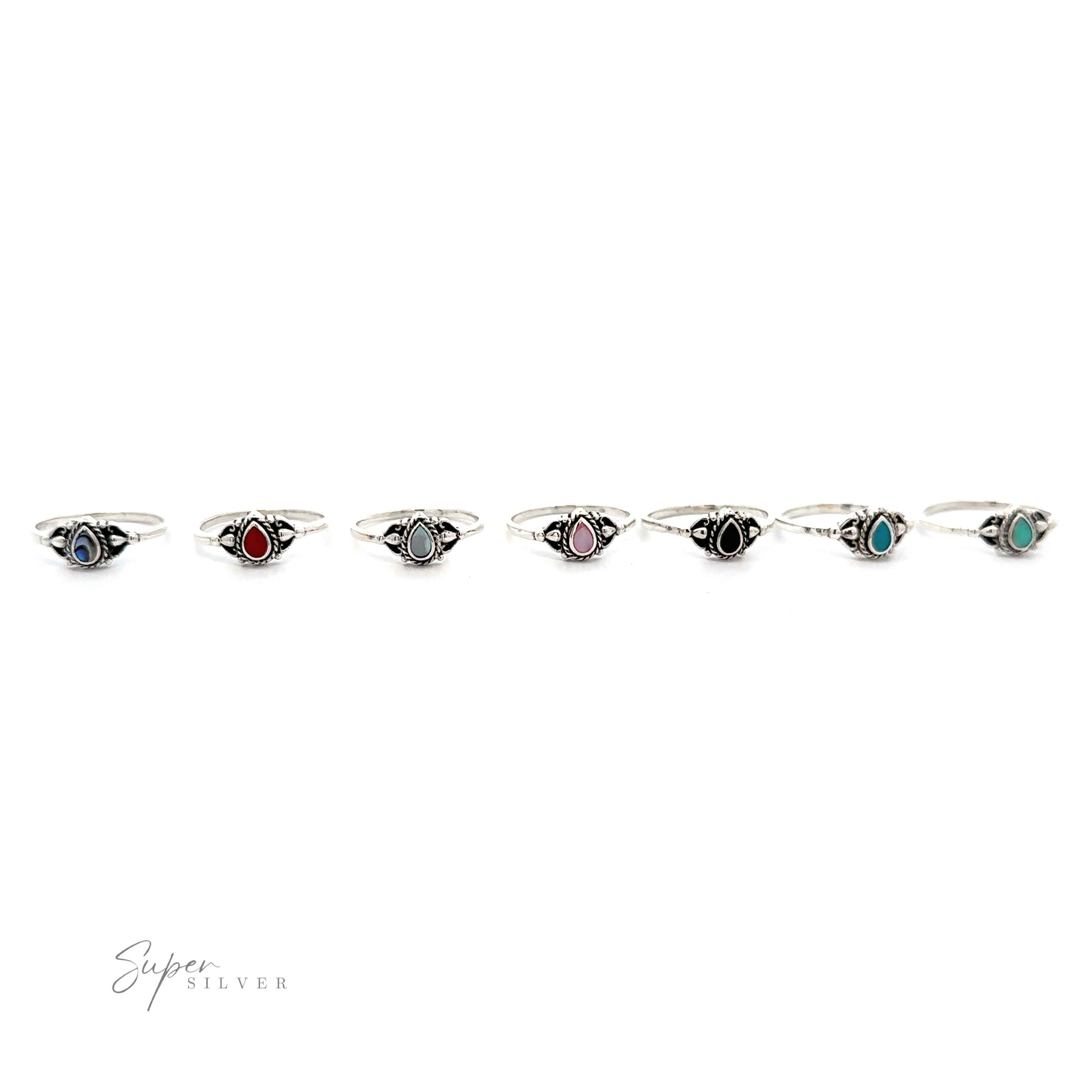 A row of Delicate Teardrop Inlay Stone Rings with turquoise set in sterling silver.