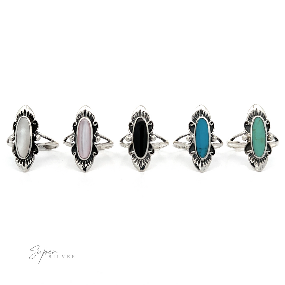 A stylish group of rings with different colored stones, including an antique look and Southwest Inspired Elongated Oval Ring.