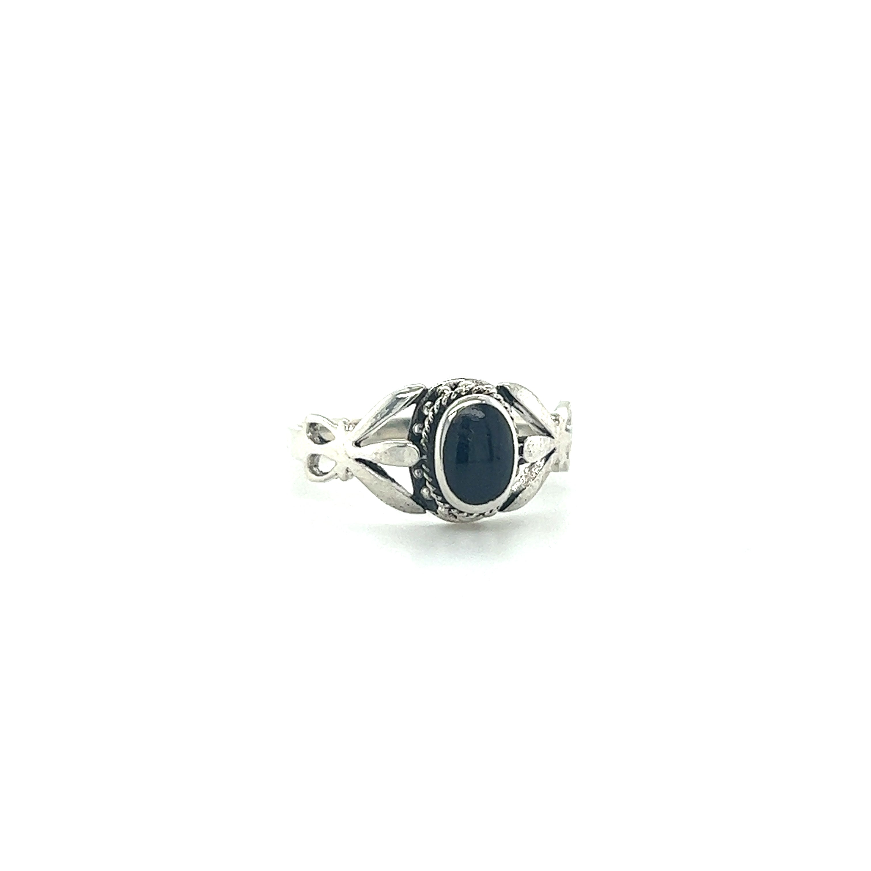 This Super Silver unique oval inlaid stone ring features an unconventional design with an inlaid oval black stone.