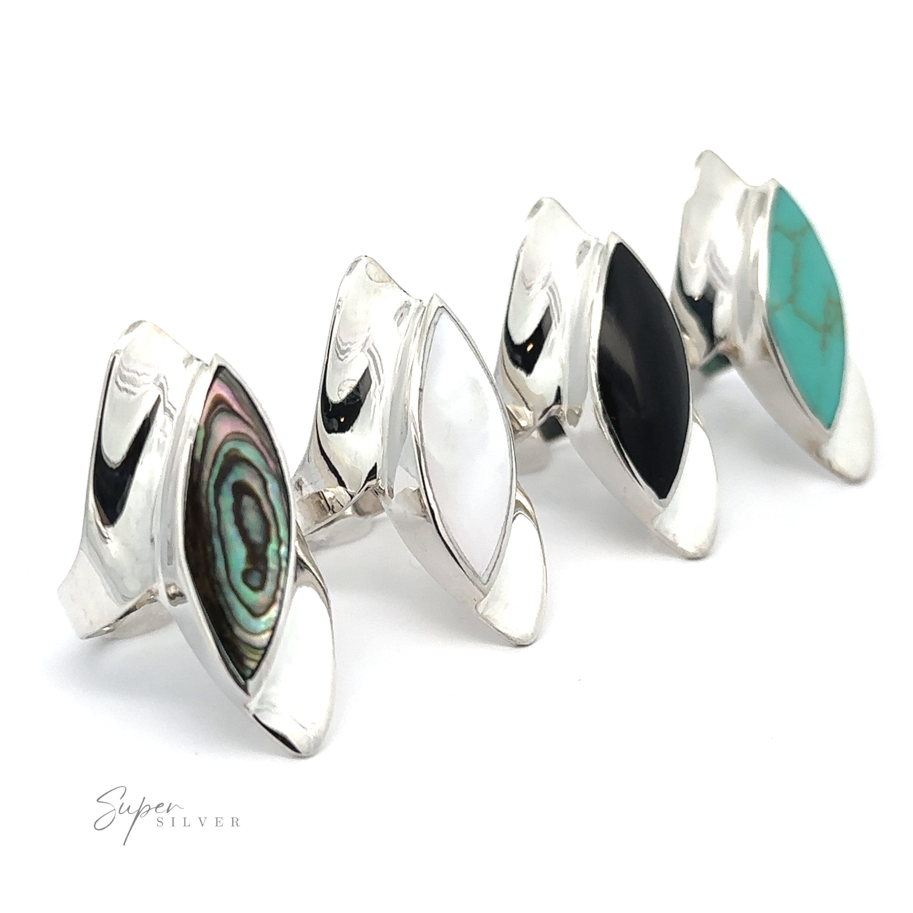 Three Modern Marquise Shaped Inlaid Stone Rings.
