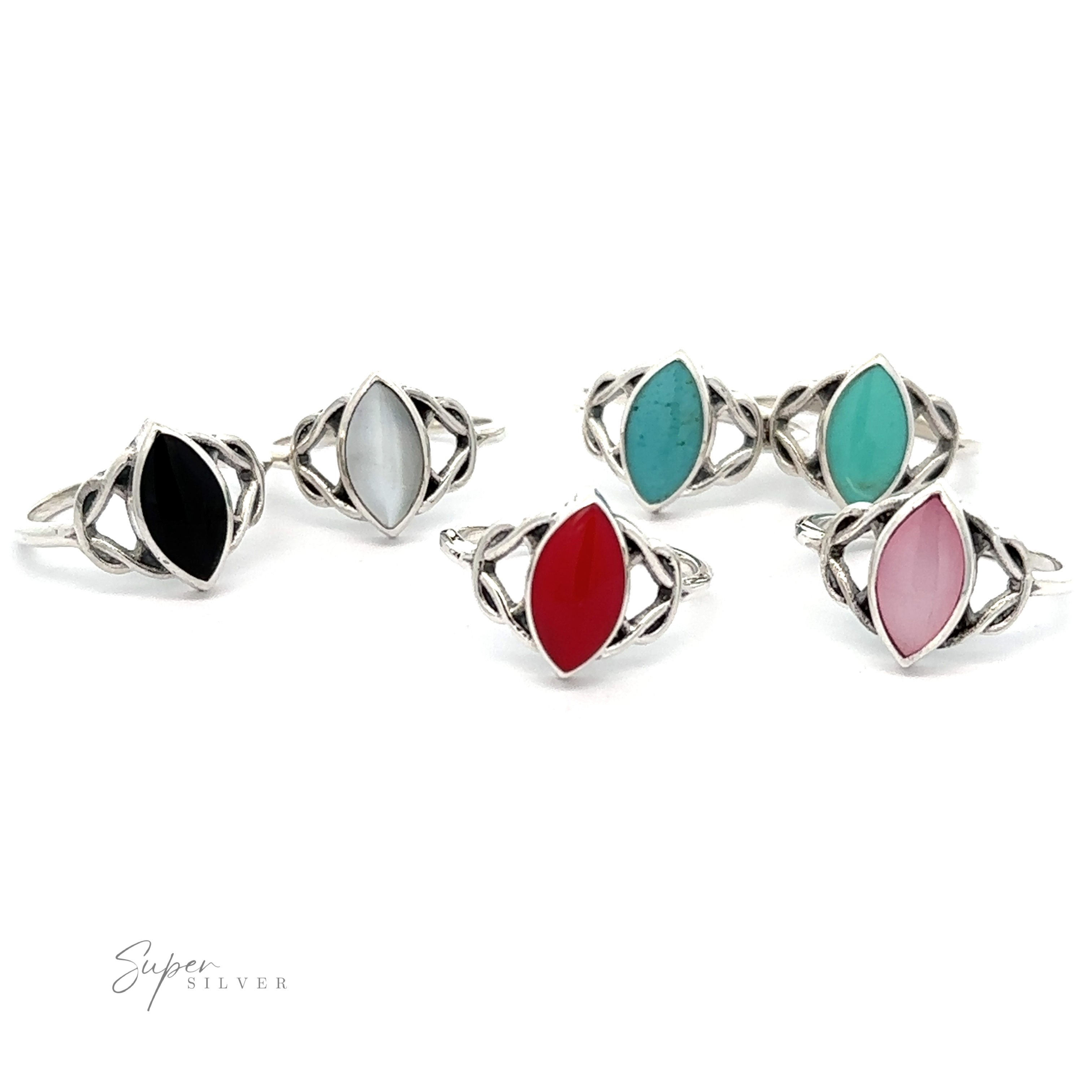 A collection of four Celtic Knot Marquise Inlaid Stone Rings set on a white background.