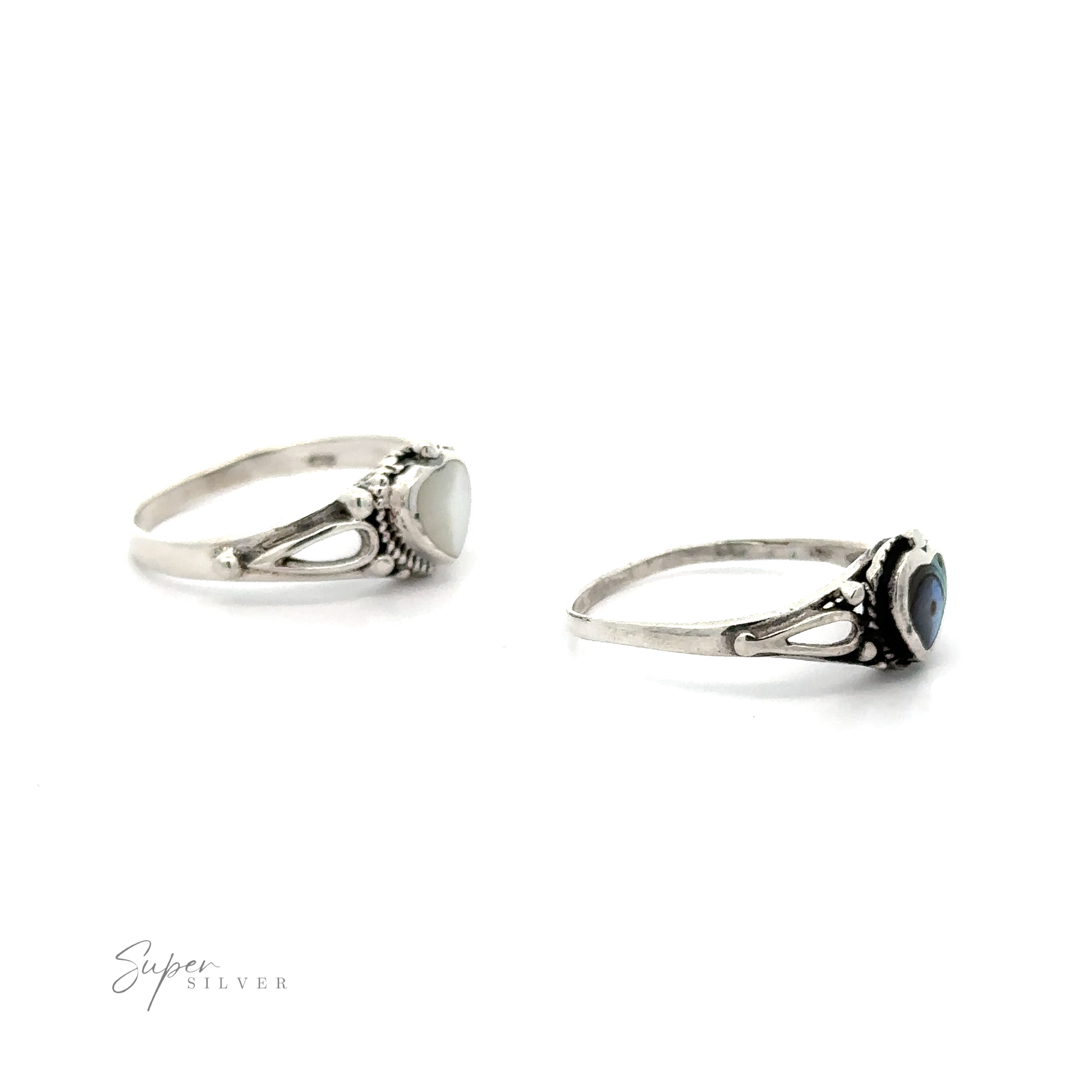 Two silver rings with Inlaid Stone Heart Rings on a white background.