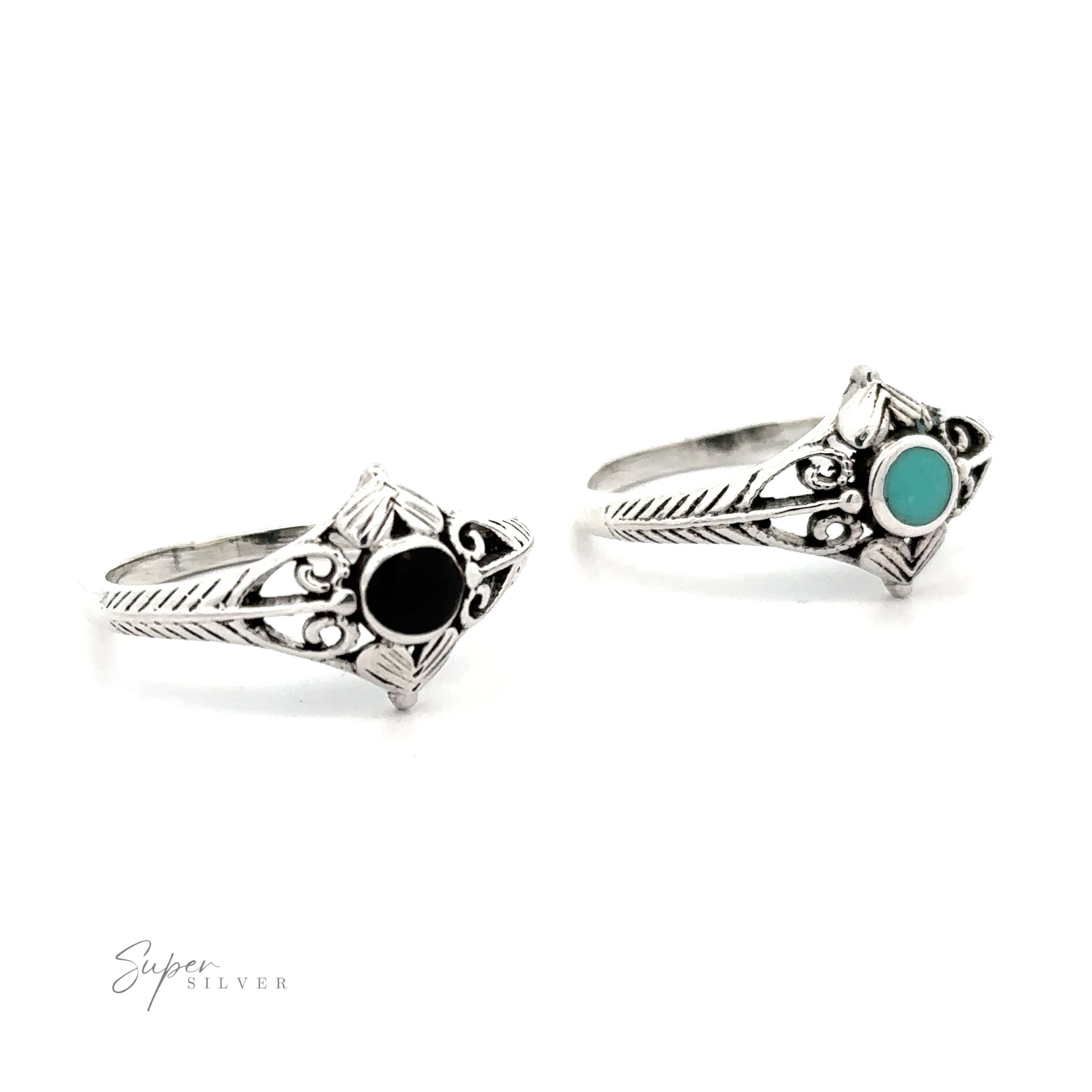 Two Inlaid Stone Diamond Shaped Rings with Filigree Accents.