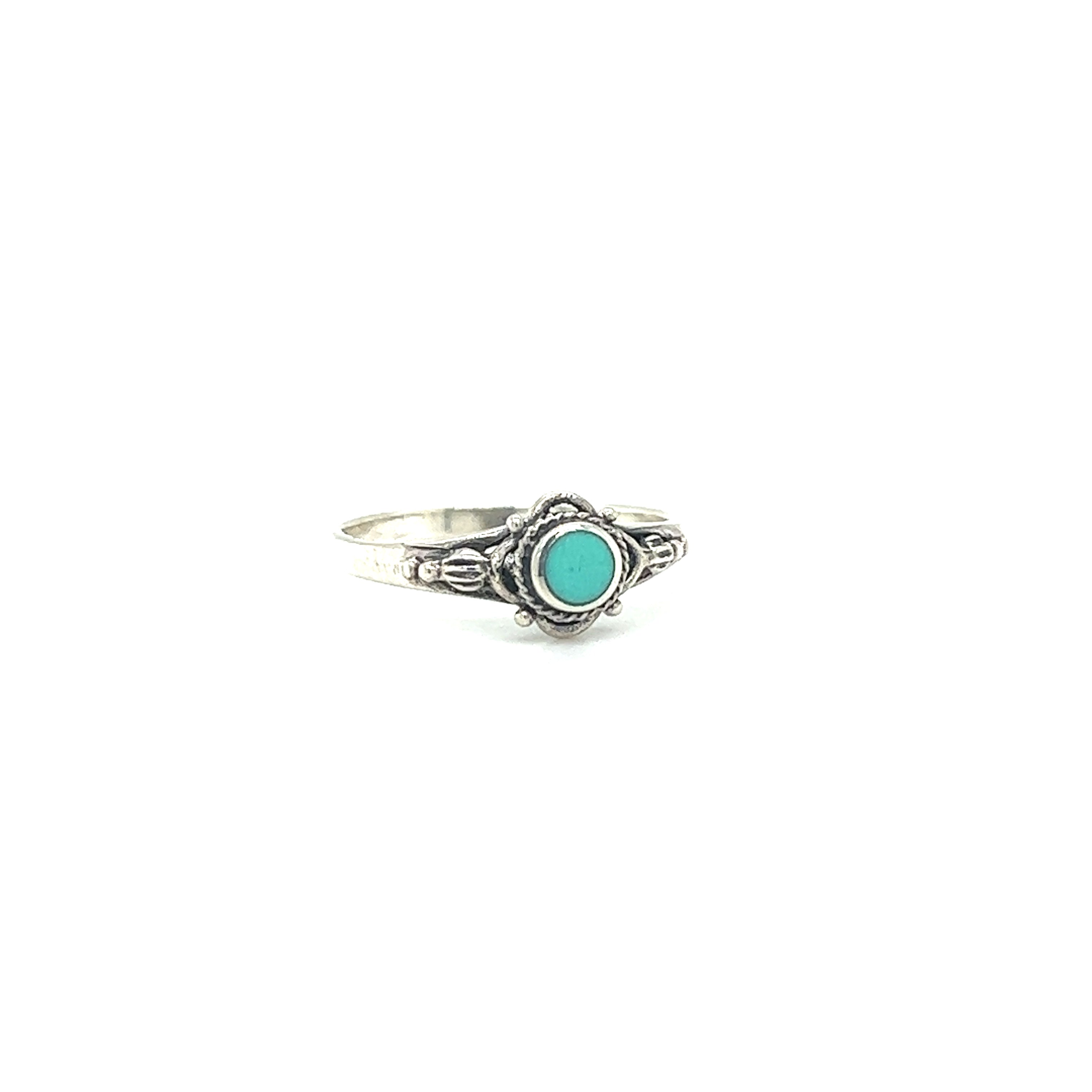 A Captivating Dainty Inlaid Stone Ring with Subtle Flower Setting from Super Silver.