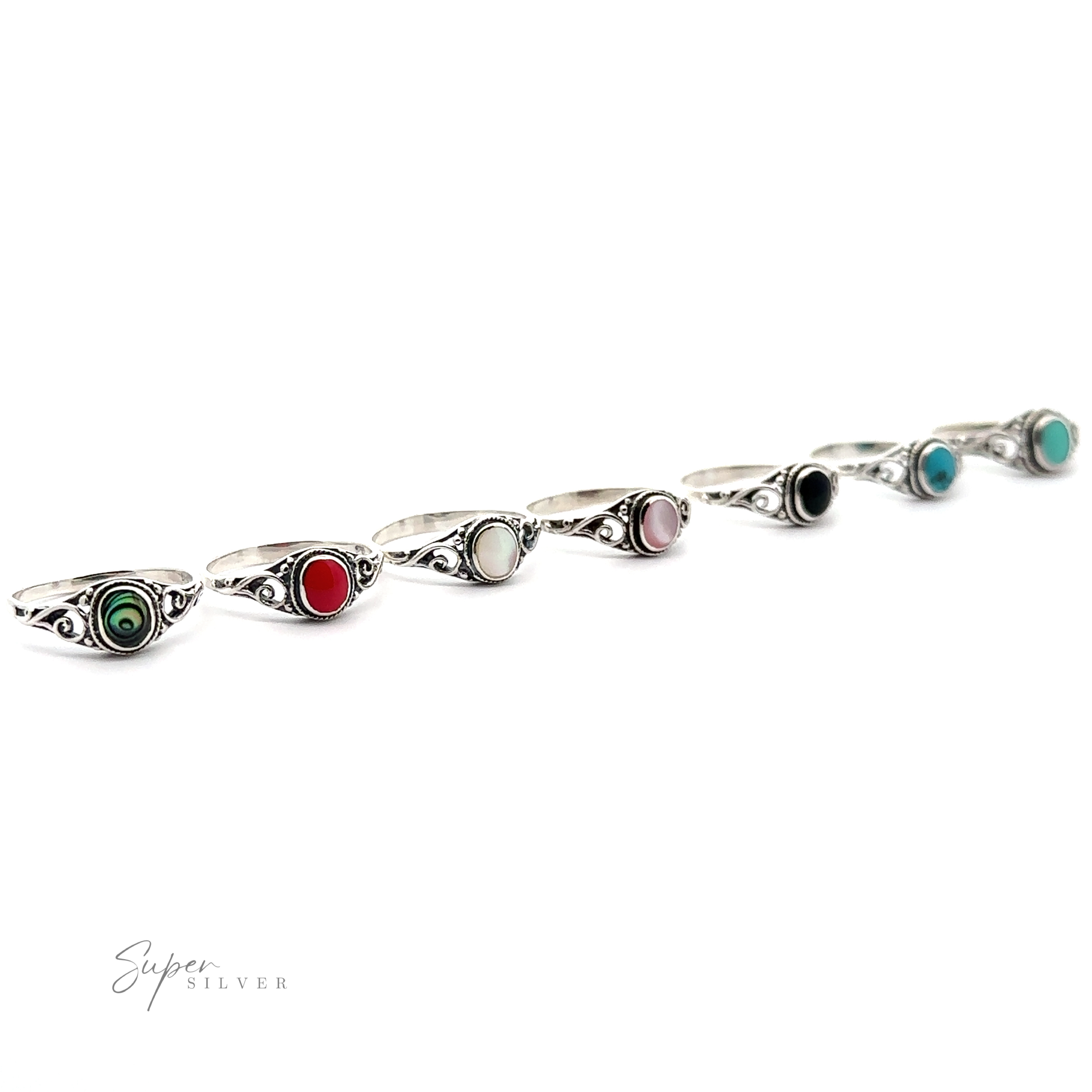 These Oval Inlay Stone Rings with Swirls showcase inlay stones in various colors.