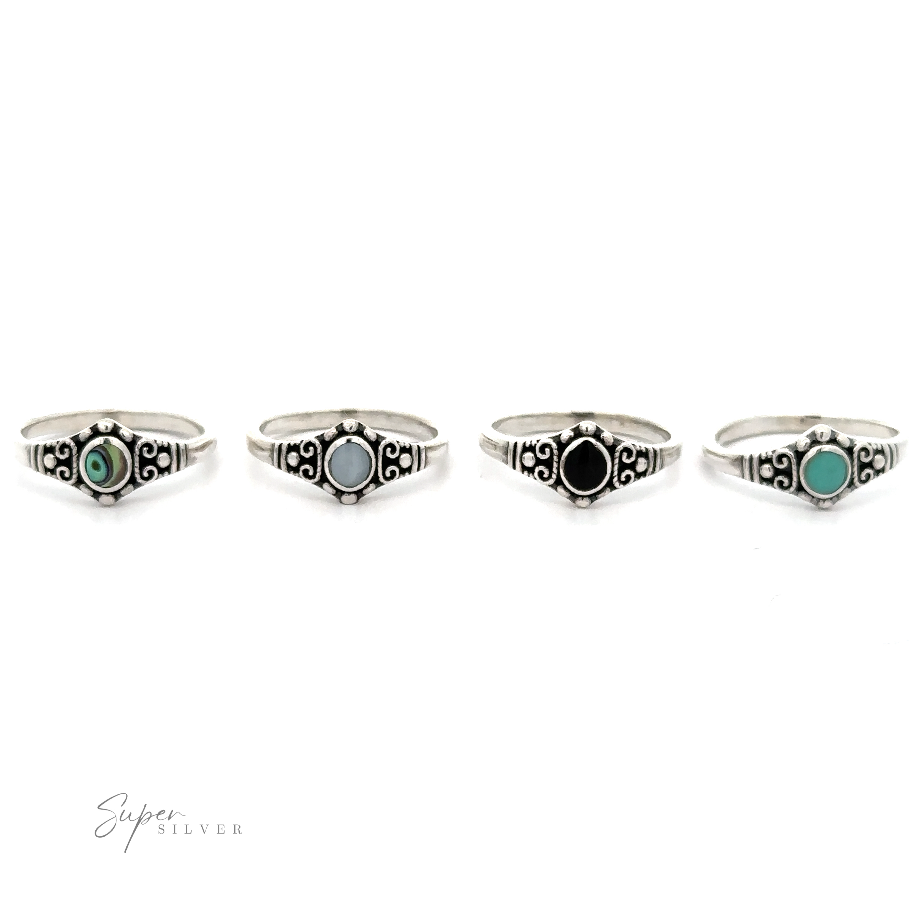 A set of four Dainty Inlaid Stone Rings With Silver Beads and Swirls with vintage charm and inlaid turquoise stones.