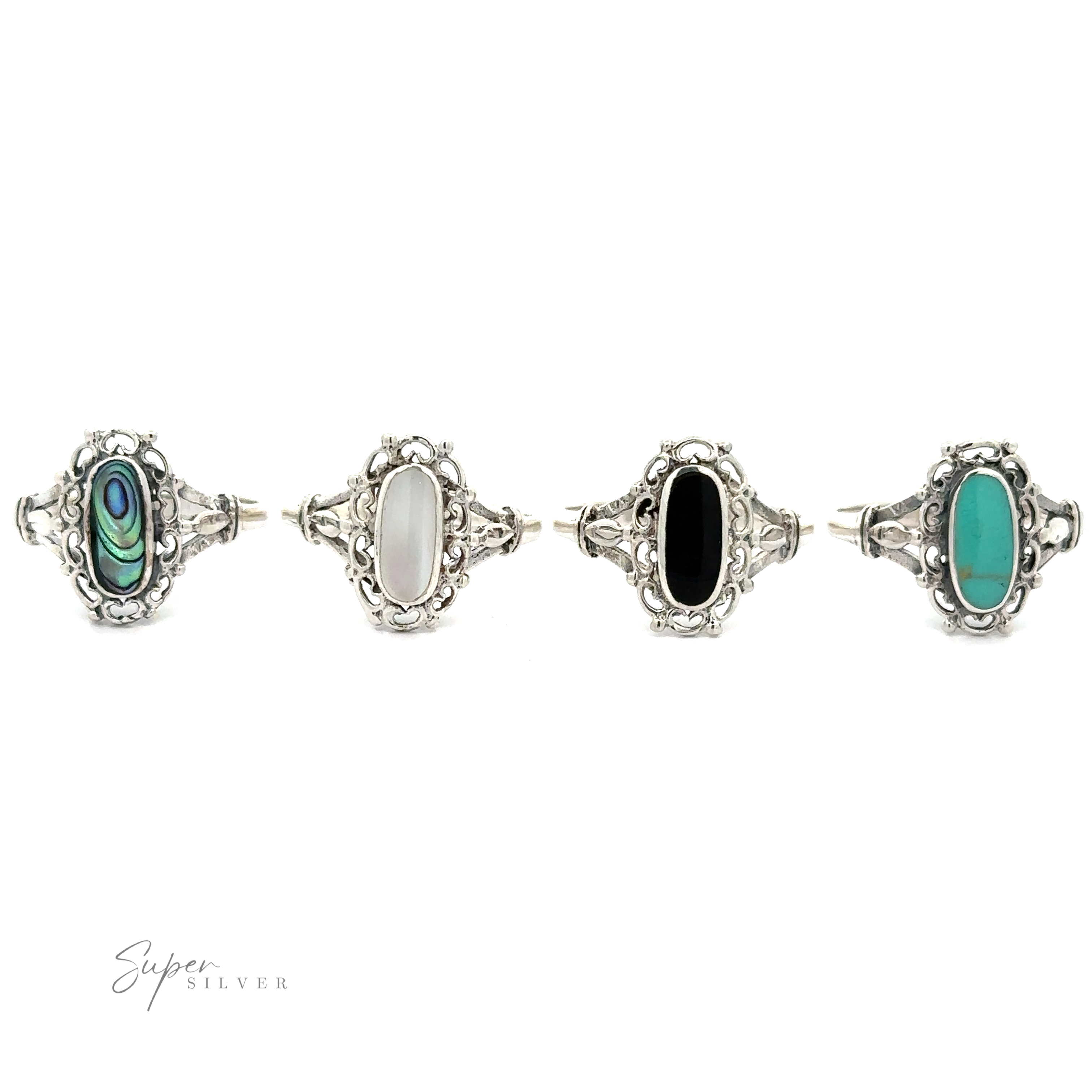 A set of four Inlaid Oval Rings with Filigree Heart Border, featuring a touch of vintage appeal.