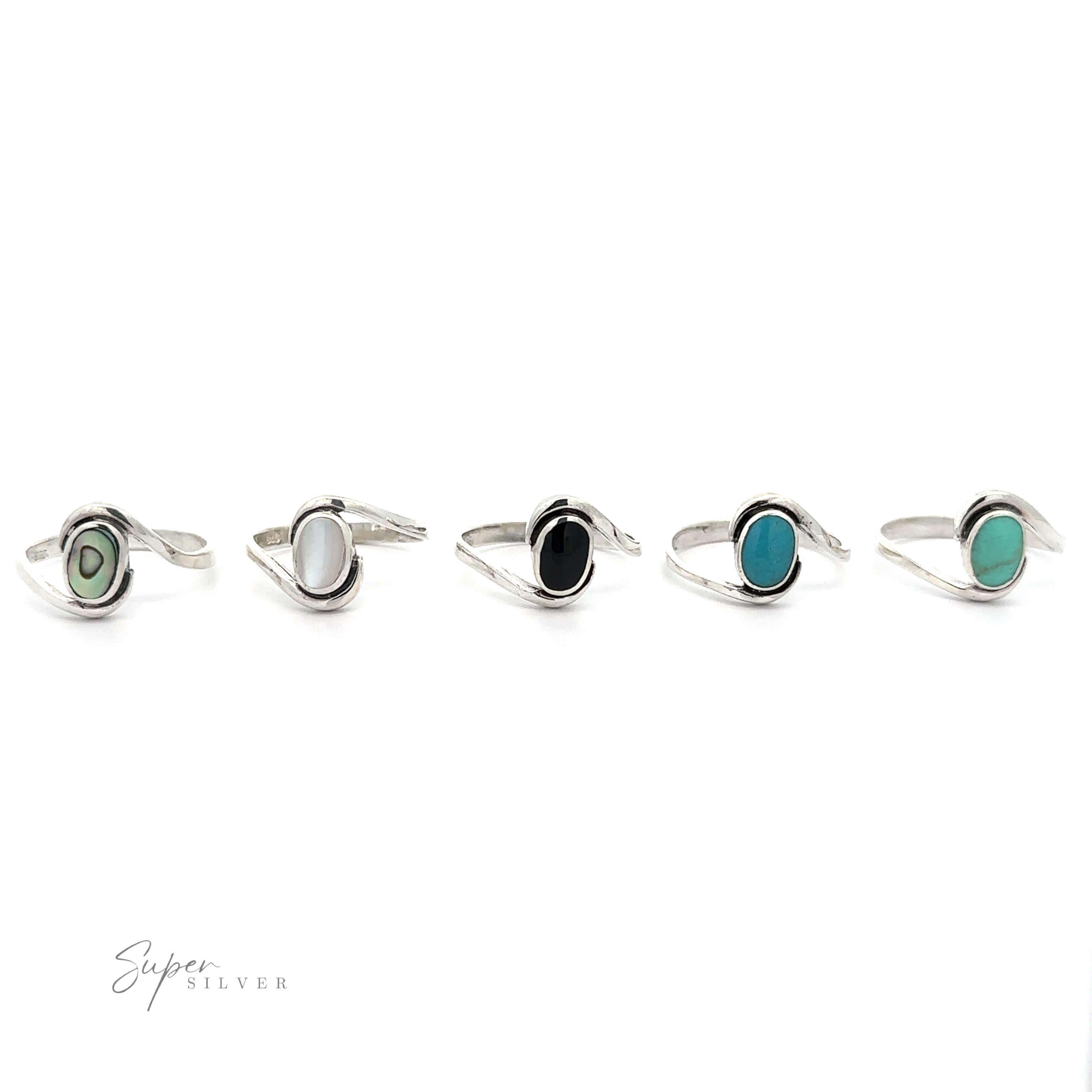 A row of Simple Freeform Rings with Oval Inlaid Stones made of sterling silver and featuring turquoise and black stones.