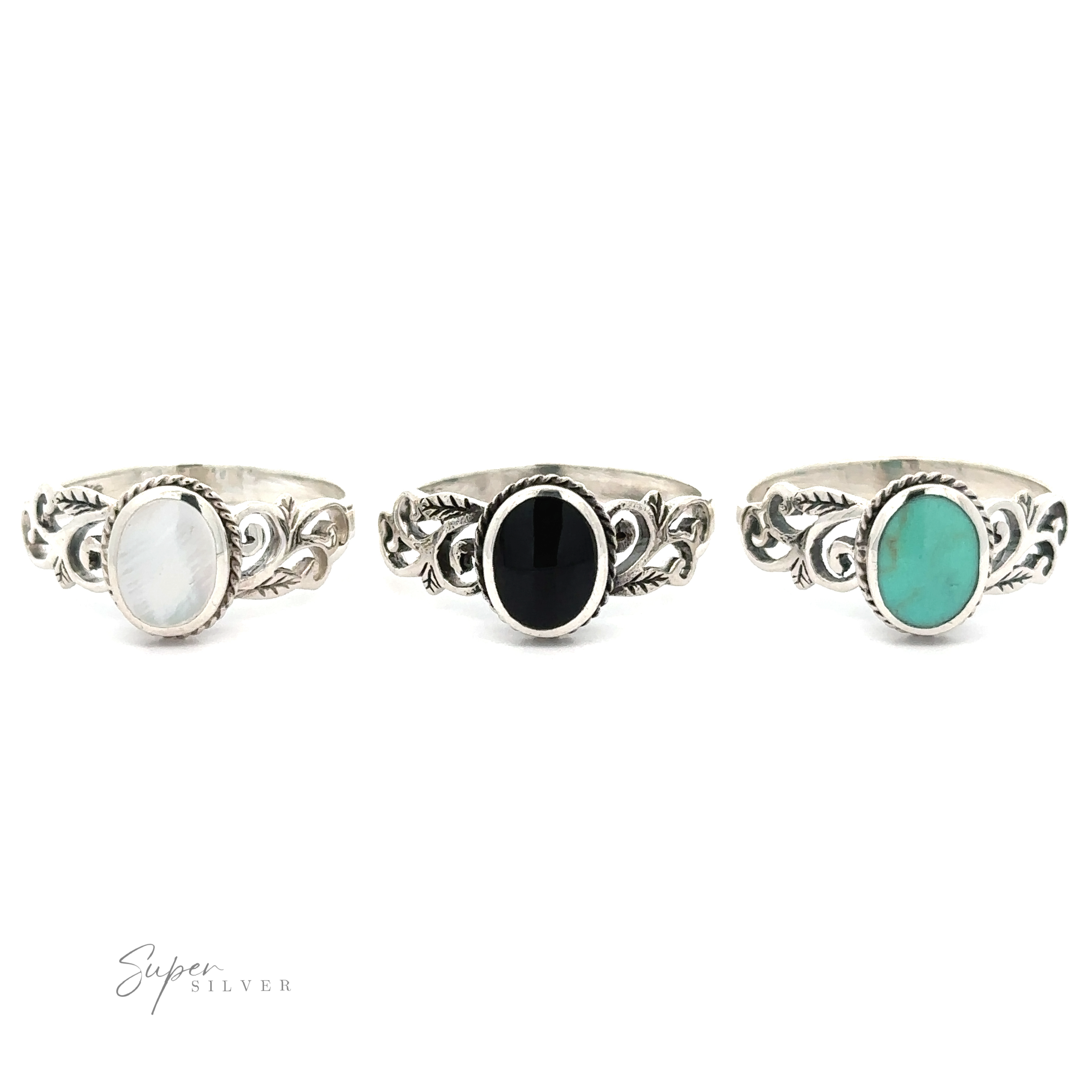 Three Oval Inlaid Rings with Swirls and Leaf Detailing.