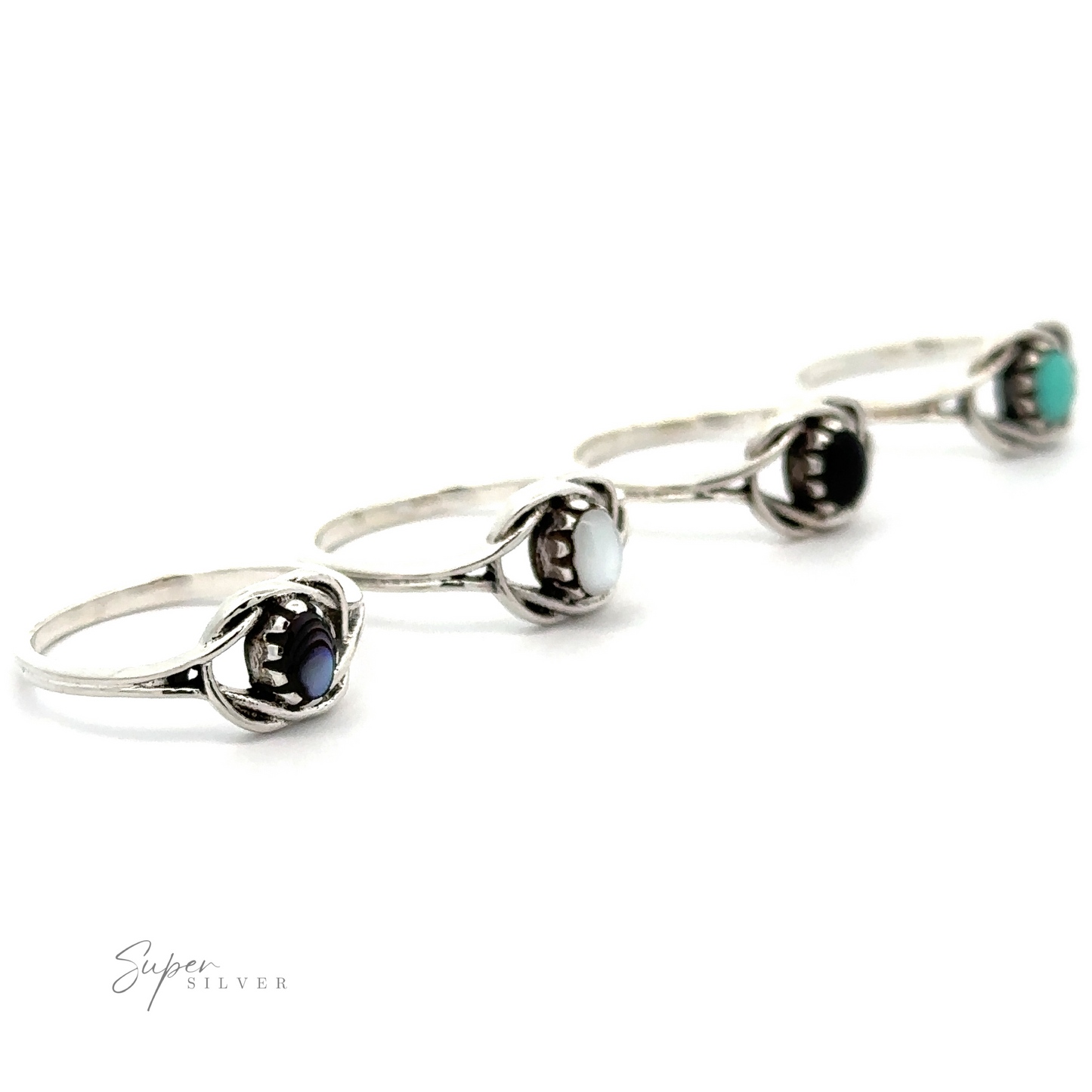 A row of Delicate Knot Rings with Oval Stones, giving off a boho vibe.