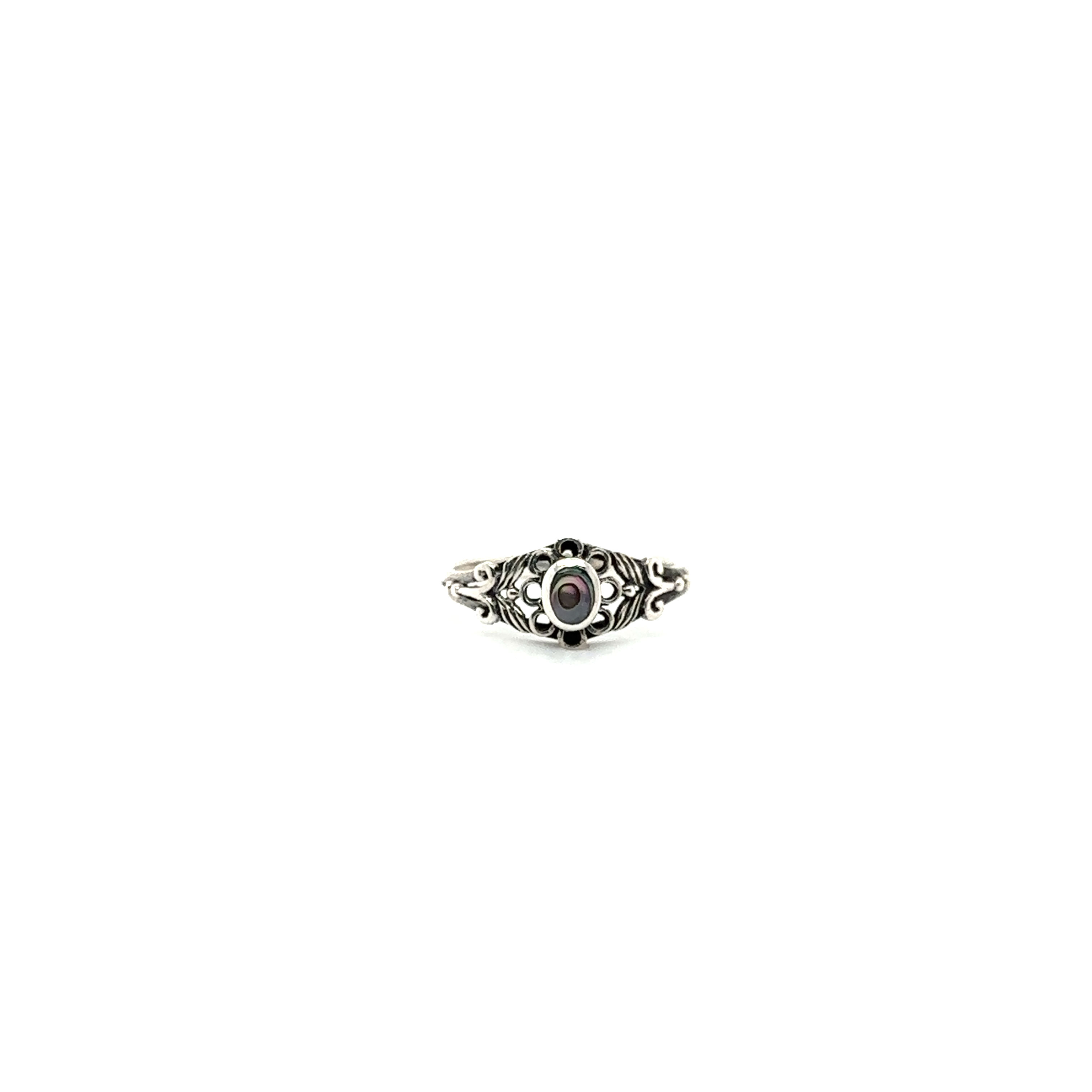 A Super Silver Oval Flower Ring with Inlay Stones adorned with a vibrant red stone at its center, exuding an earthly charm.