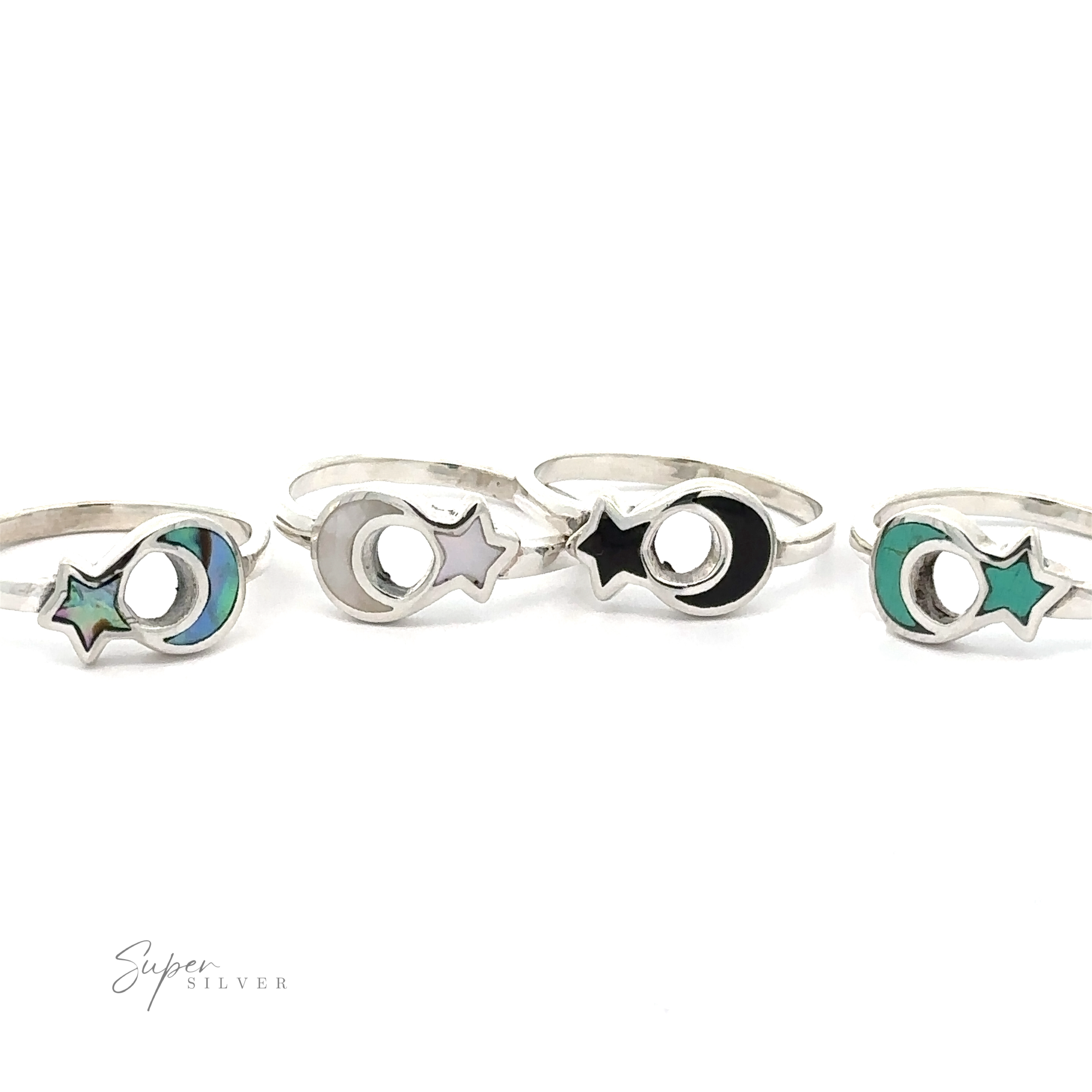 Five Crescent Moon And Star Rings with inlaid stones, displayed in a row against a white background.