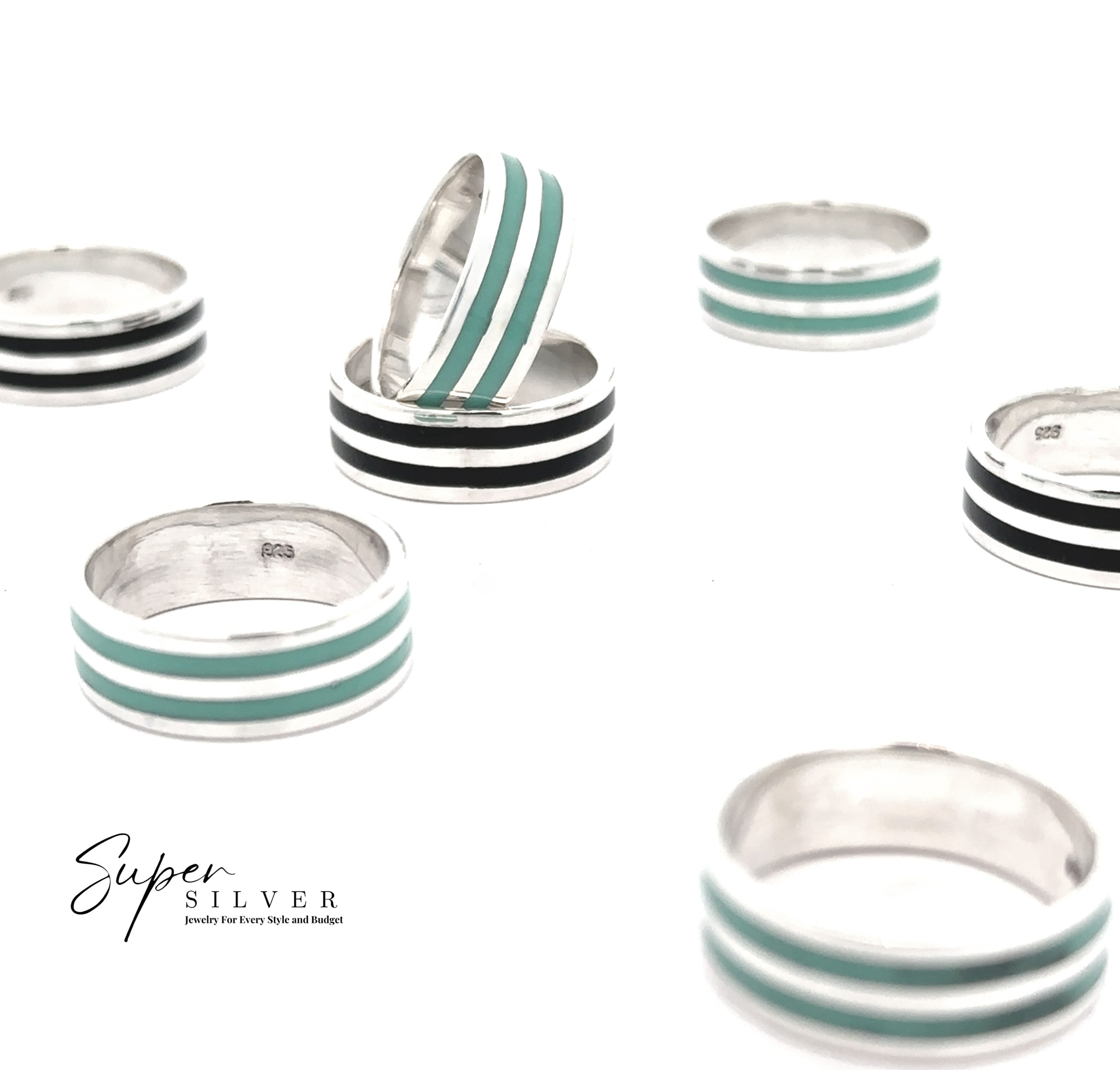 Seven "Double Stripe Inlay Band" sterling silver rings feature horizontal enamel stripes in black, onyx, or turquoise and are displayed on a white background. The "Super Silver" brand logo is shown in the lower left corner.