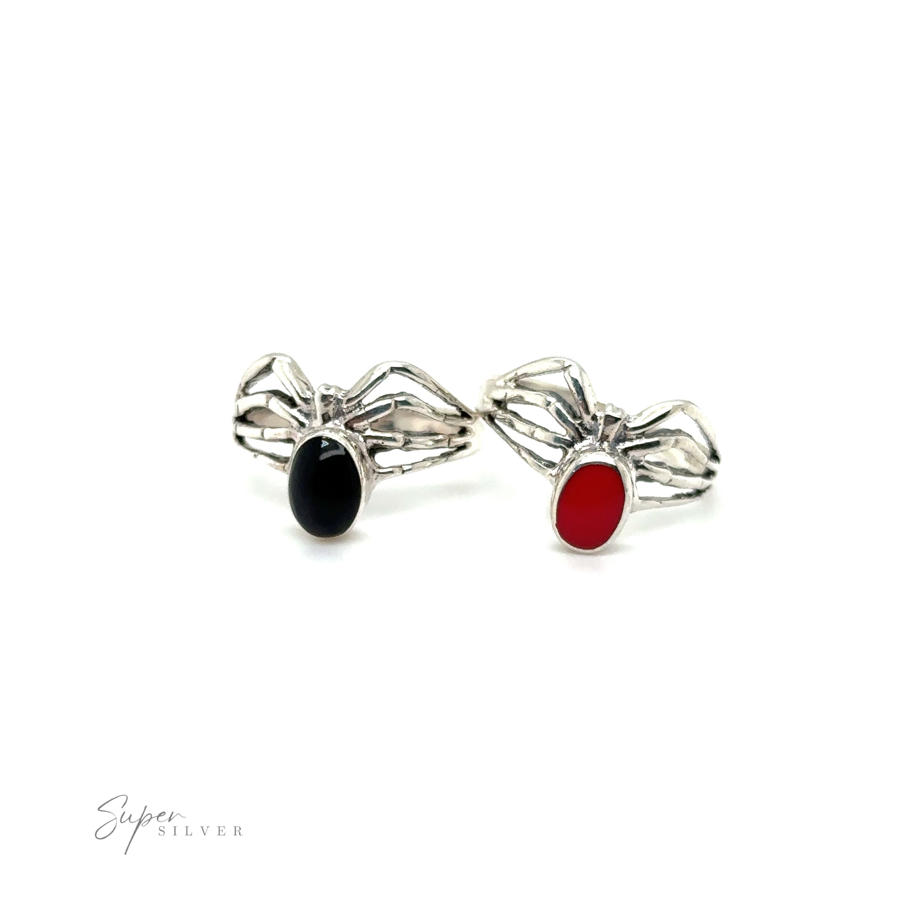 Two enchanting Super Silver Inlay Stone Spider Rings adorned with mystical red and black stones.