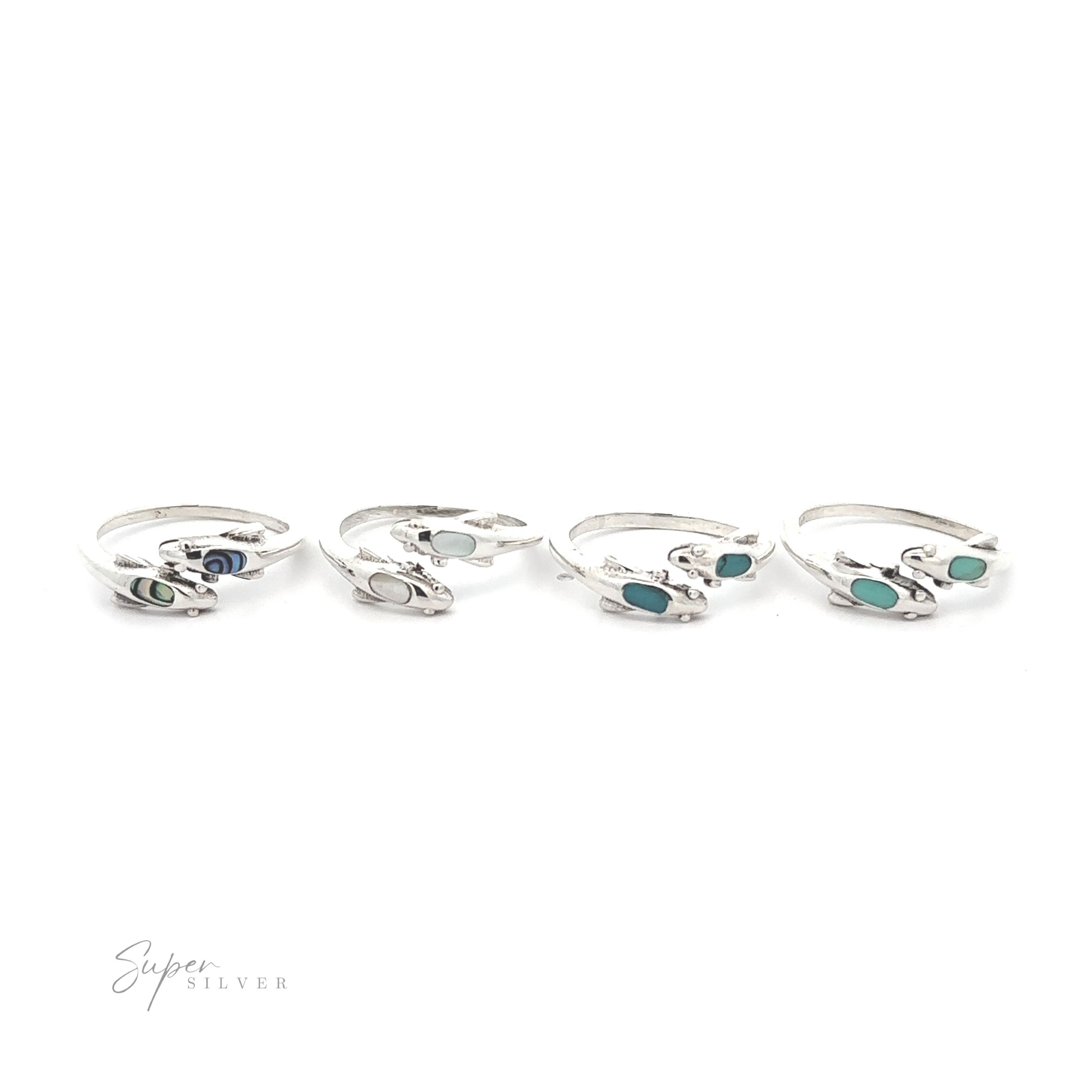 Four Dainty Inlaid Dolphin Rings with varying shades of blue and green gemstone inlays, displayed on a white background.