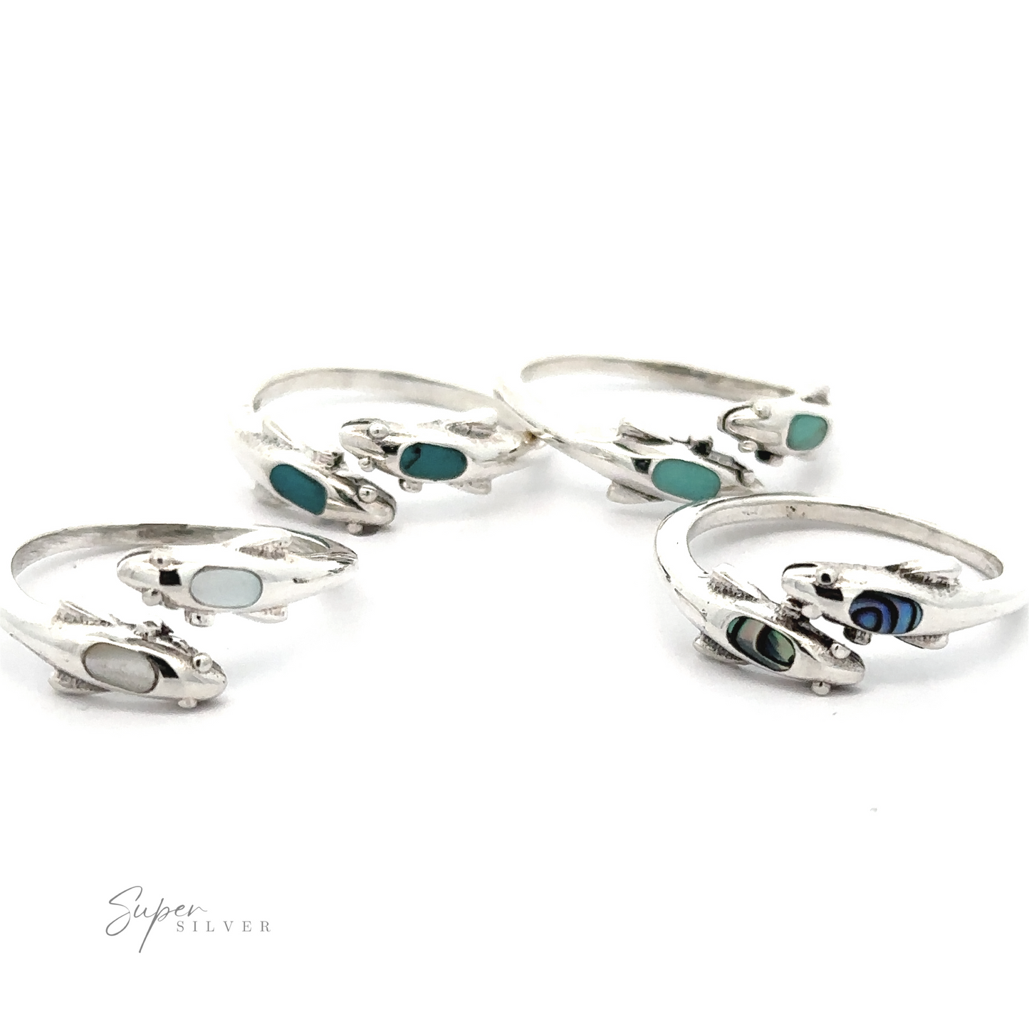 Four sterling silver adjustable Dainty Inlaid Dolphin rings with turquoise and black bead accents, displayed on a white background.