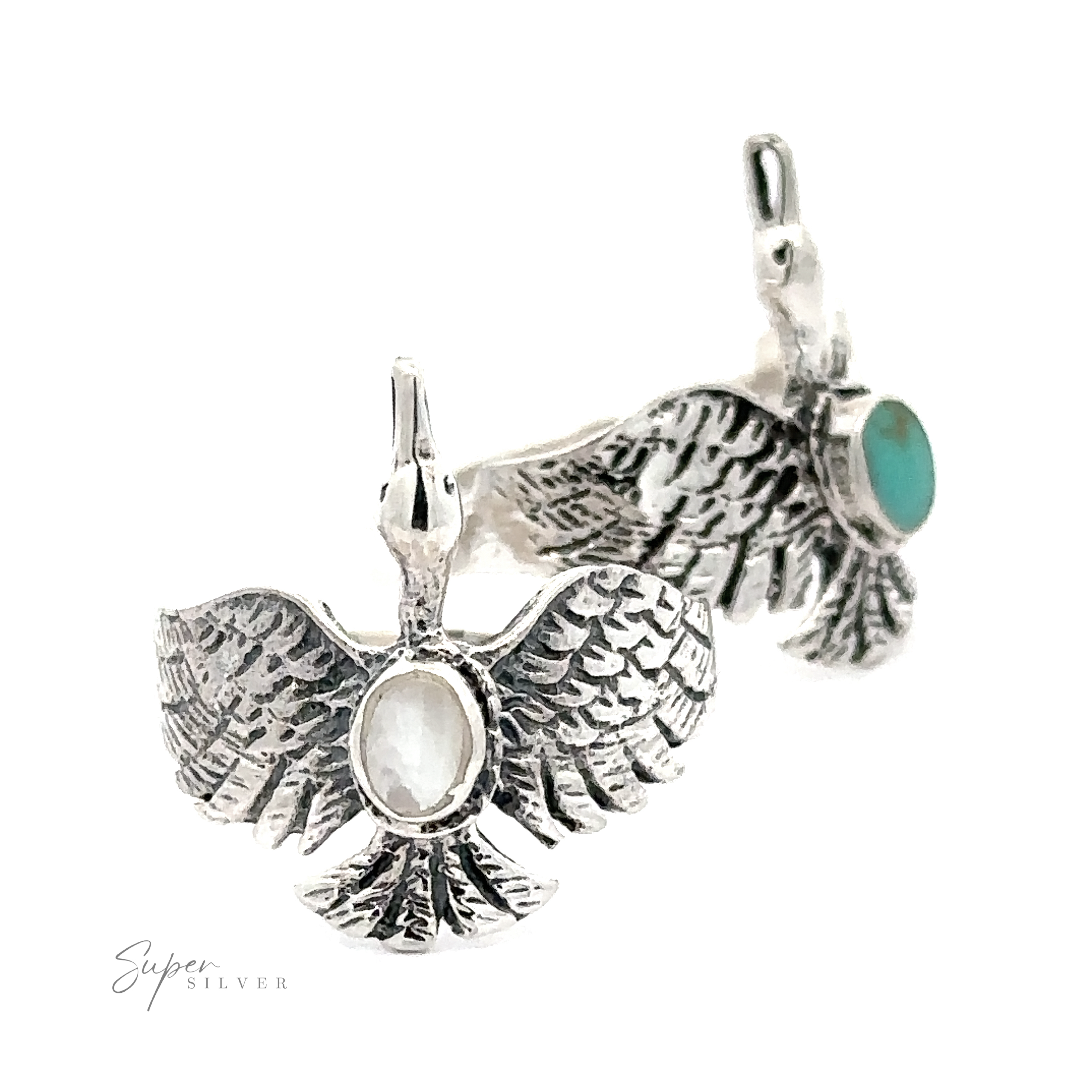 A pair of sterling silver swan earrings with oval turquoise stones.