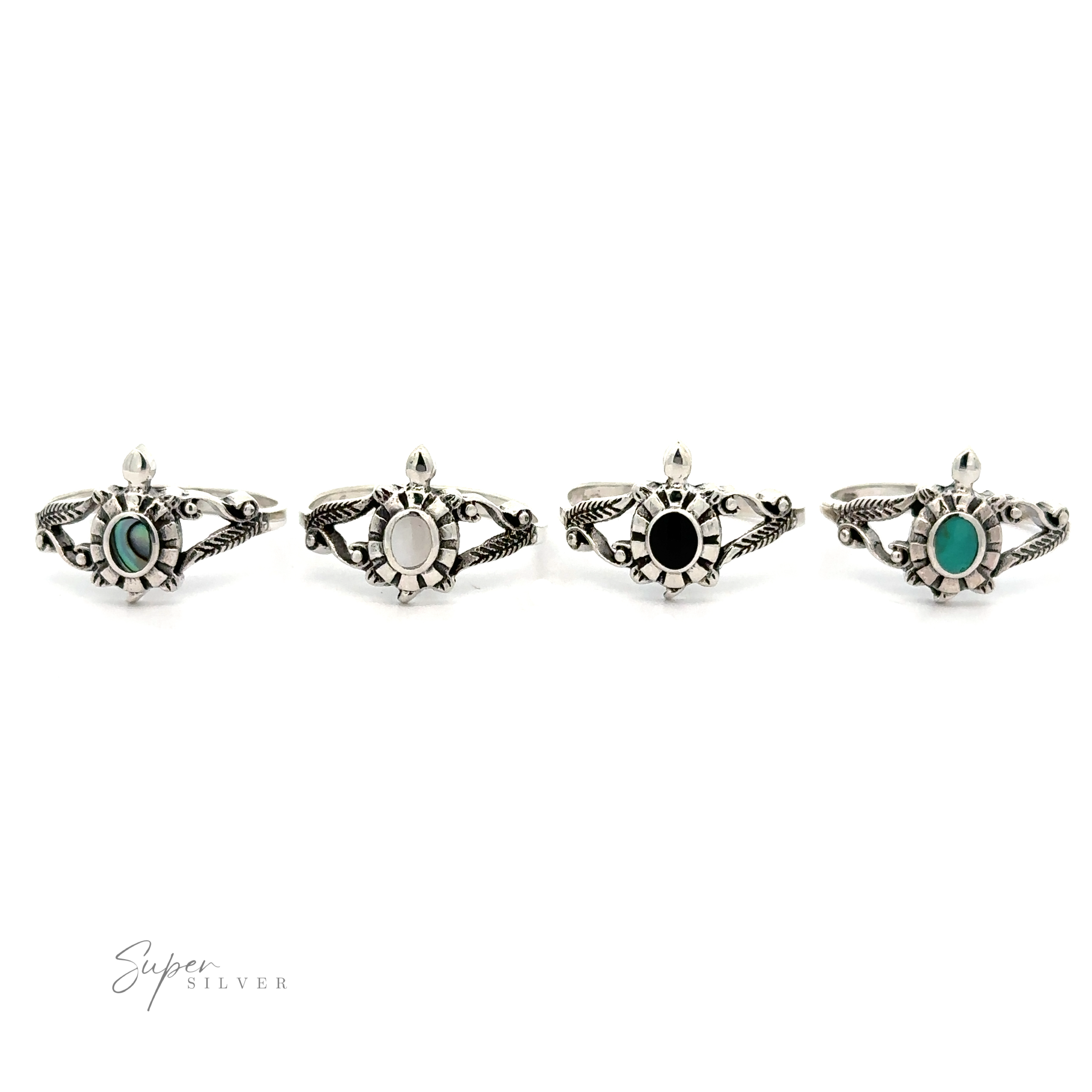 A set of four Inlay Stone Turtle Rings with Leaf Detailing.