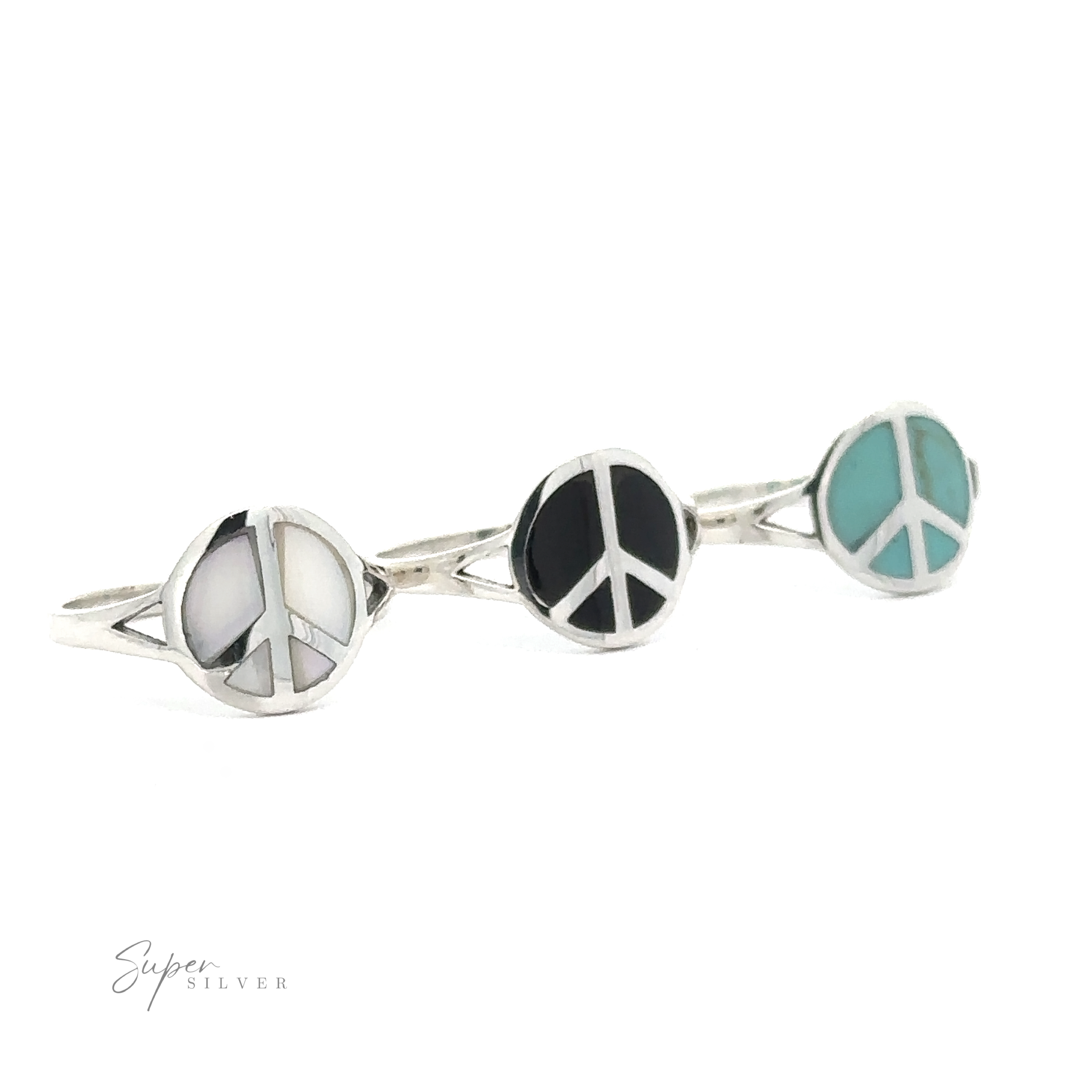 Stone Inlay Peace Sign Ring with circular designs, featuring white, black onyx, and turquoise inlays, photographed against a white background.