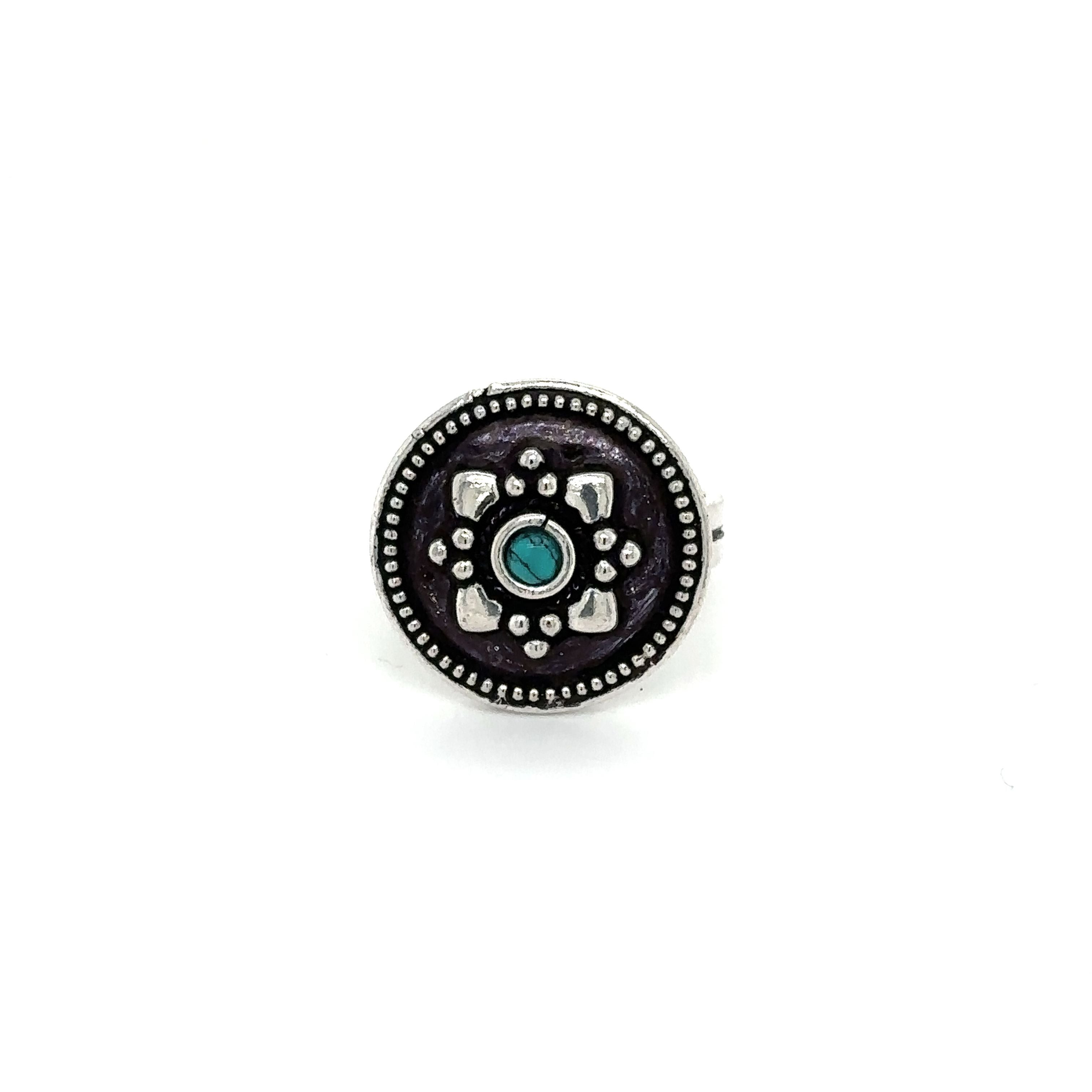 A stunning Tibetan-Style ring with a turquoise stone.