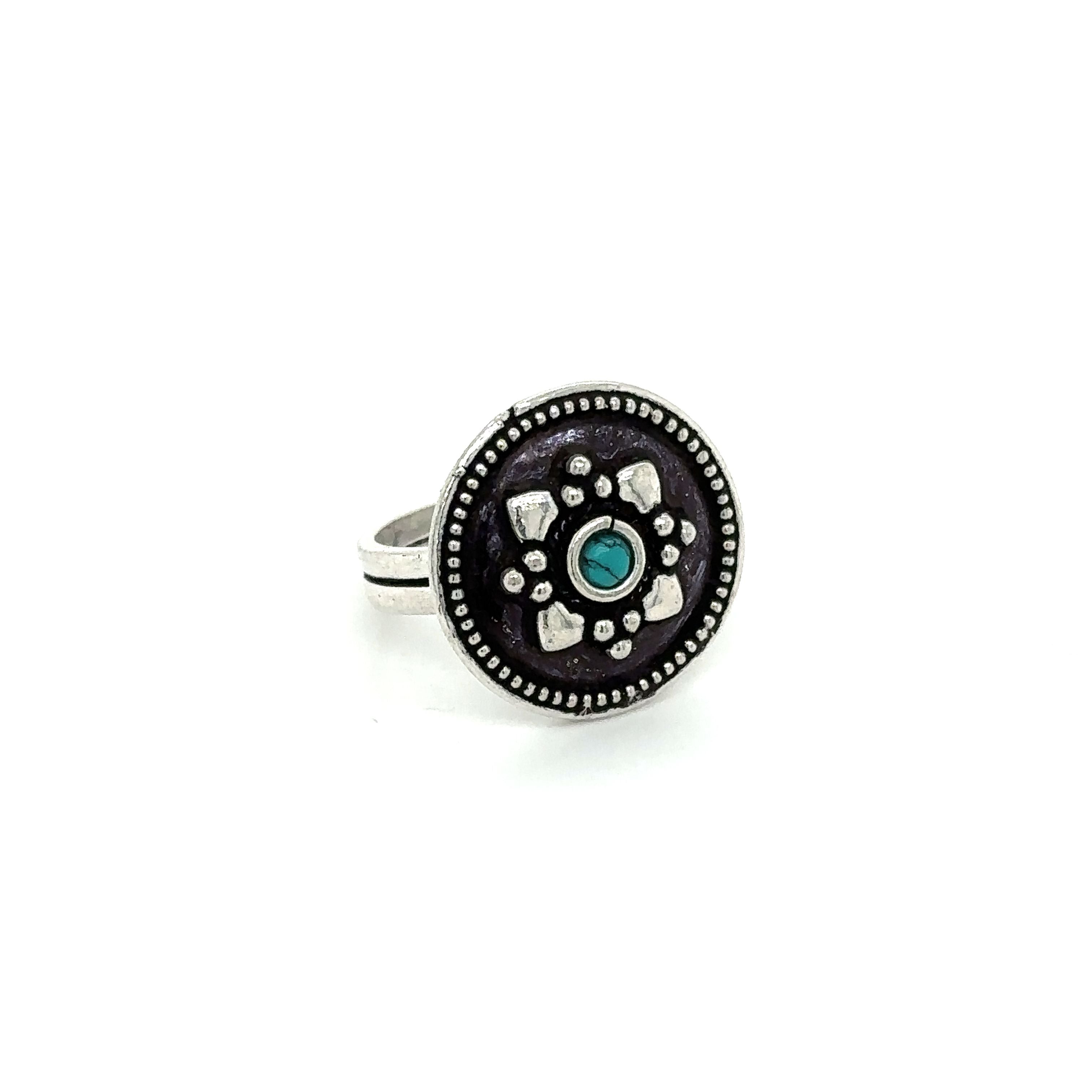 A stunning Tibetan-style ring with a turquoise stone.