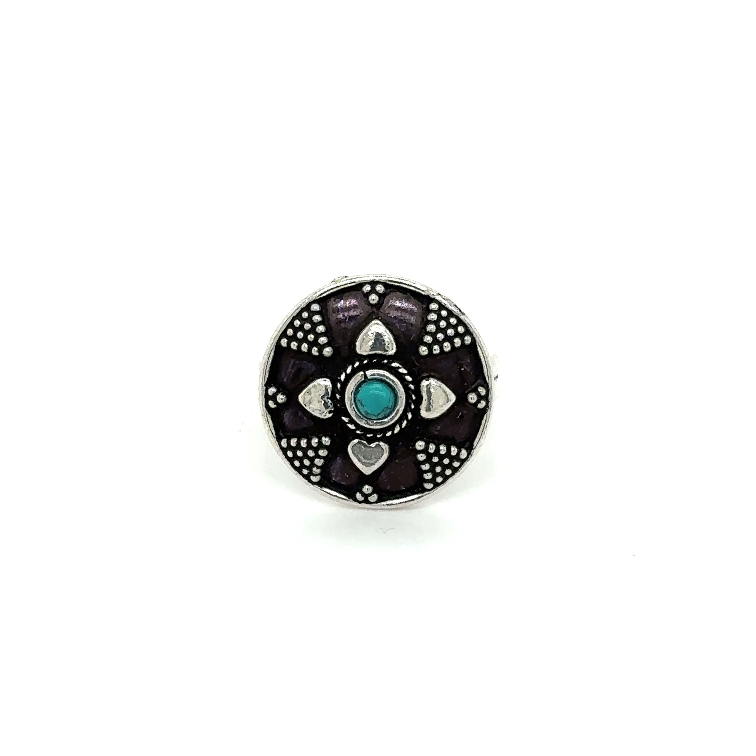 A Stunning Tibetan-Style Ring with a Turquoise Stone. --> A Stunning Tibetan-Style Ring with a Small Stone.