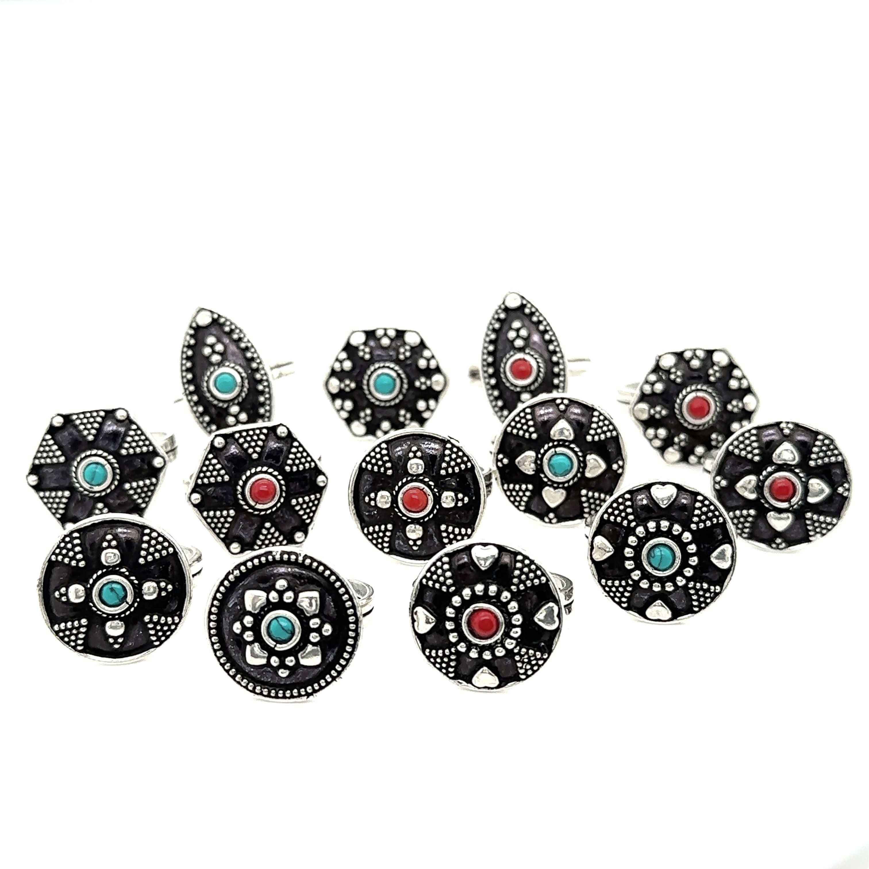 A Tibetan-Style masterpiece of rings with red, blue, and green Small Stones.