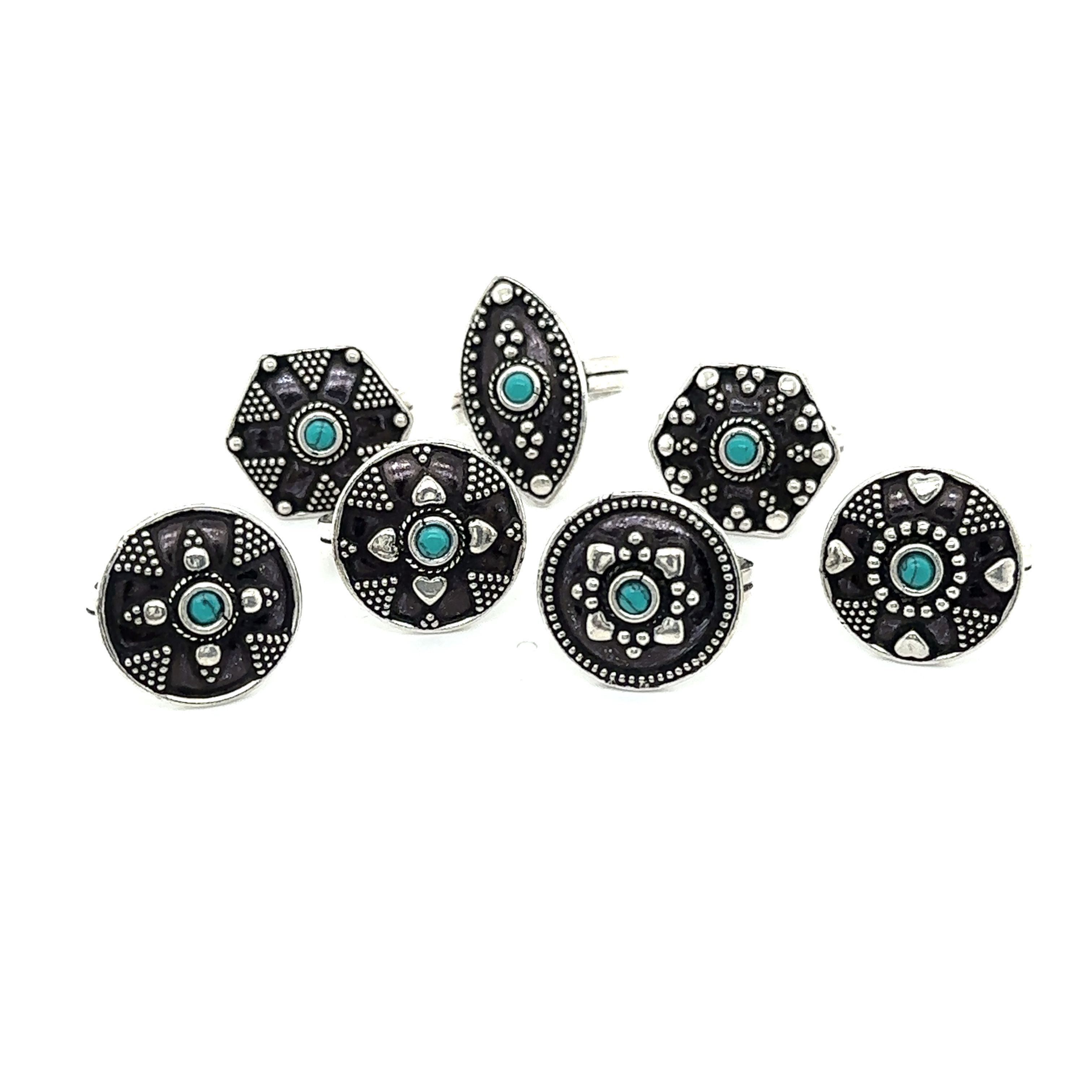A stunning set of Tibetan-Style Rings with Small Stones studs.