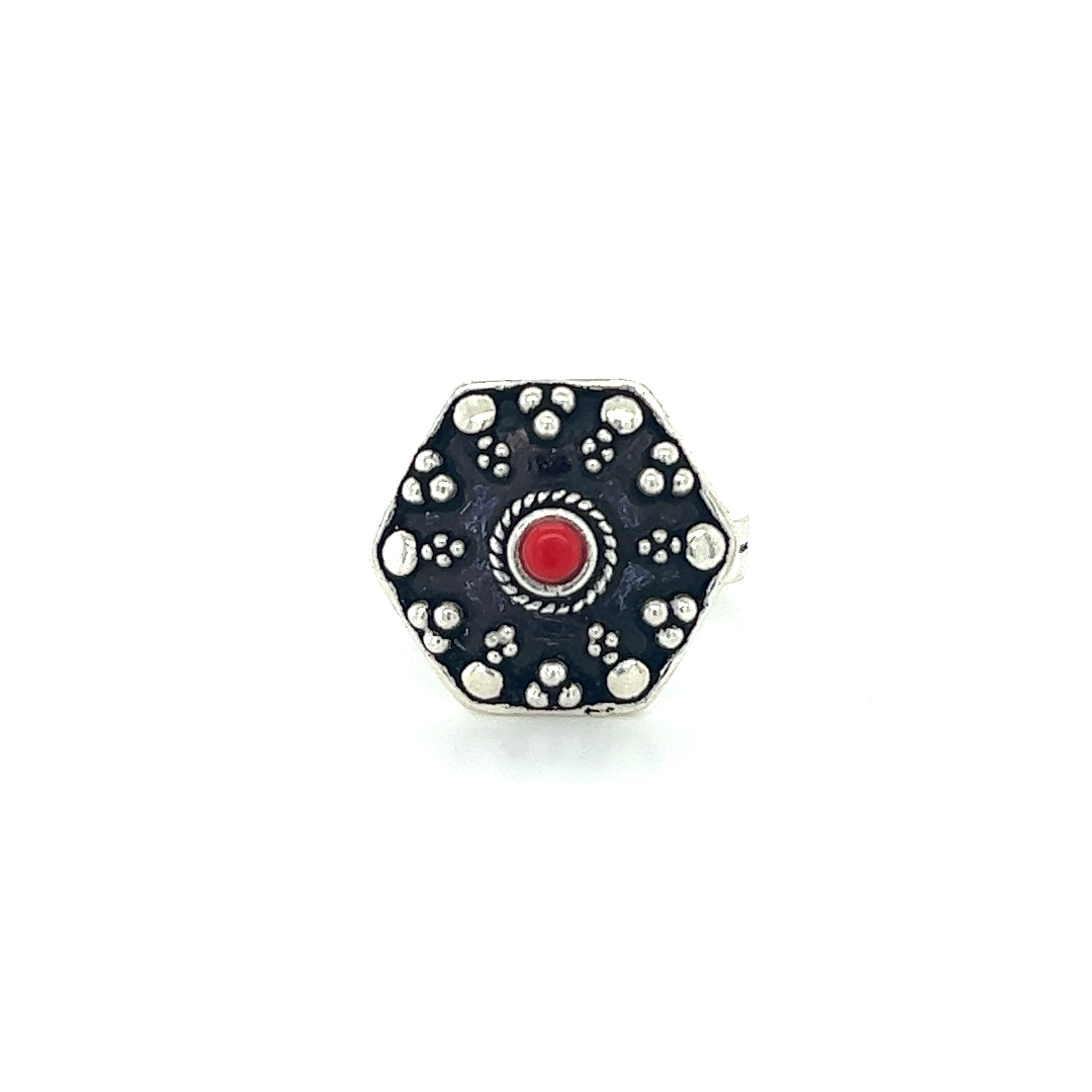 A stunning Tibetan-Style ring with an octagonal red stone.