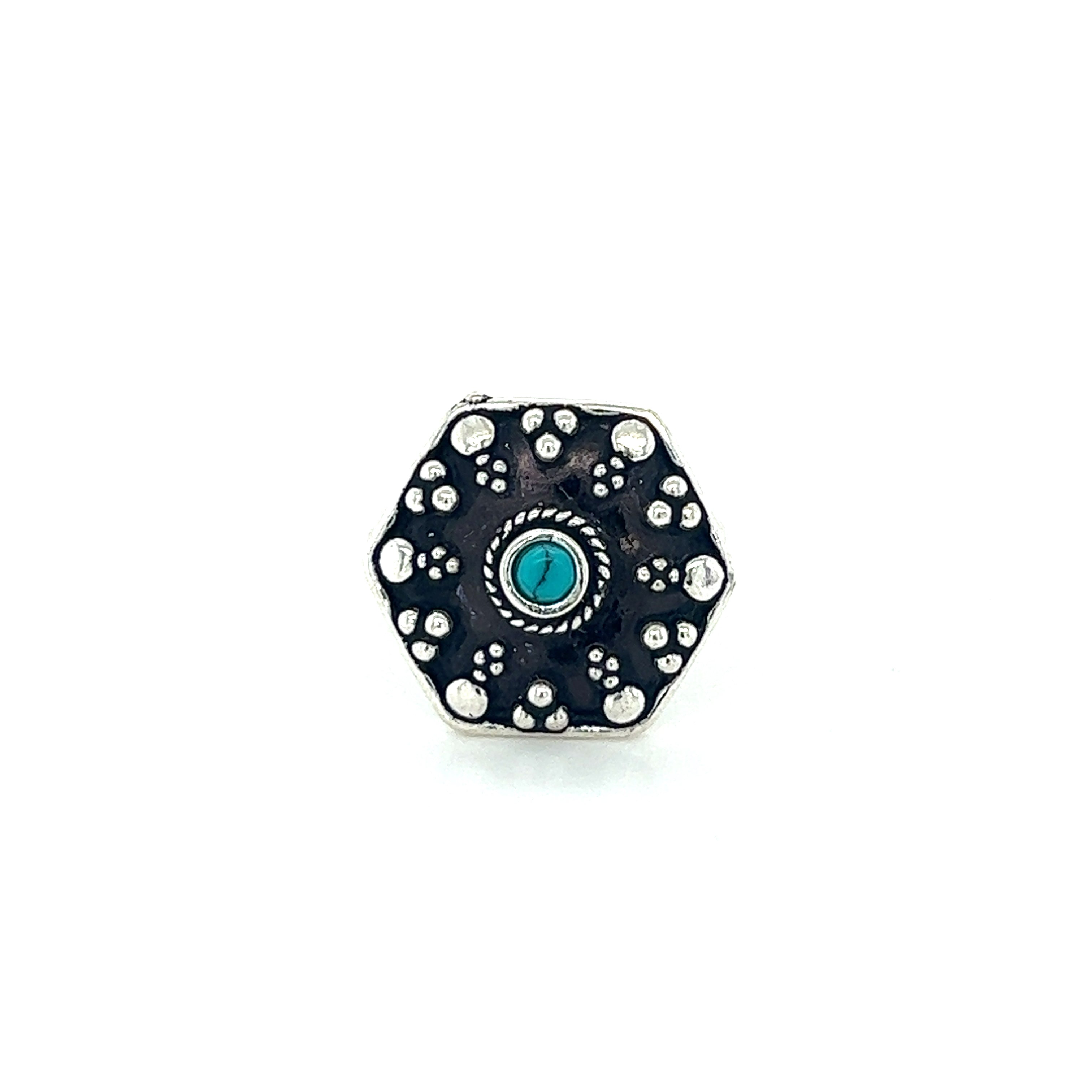 A stunning Tibetan-Style ring with a turquoise stone, making it a bohemian masterpiece.