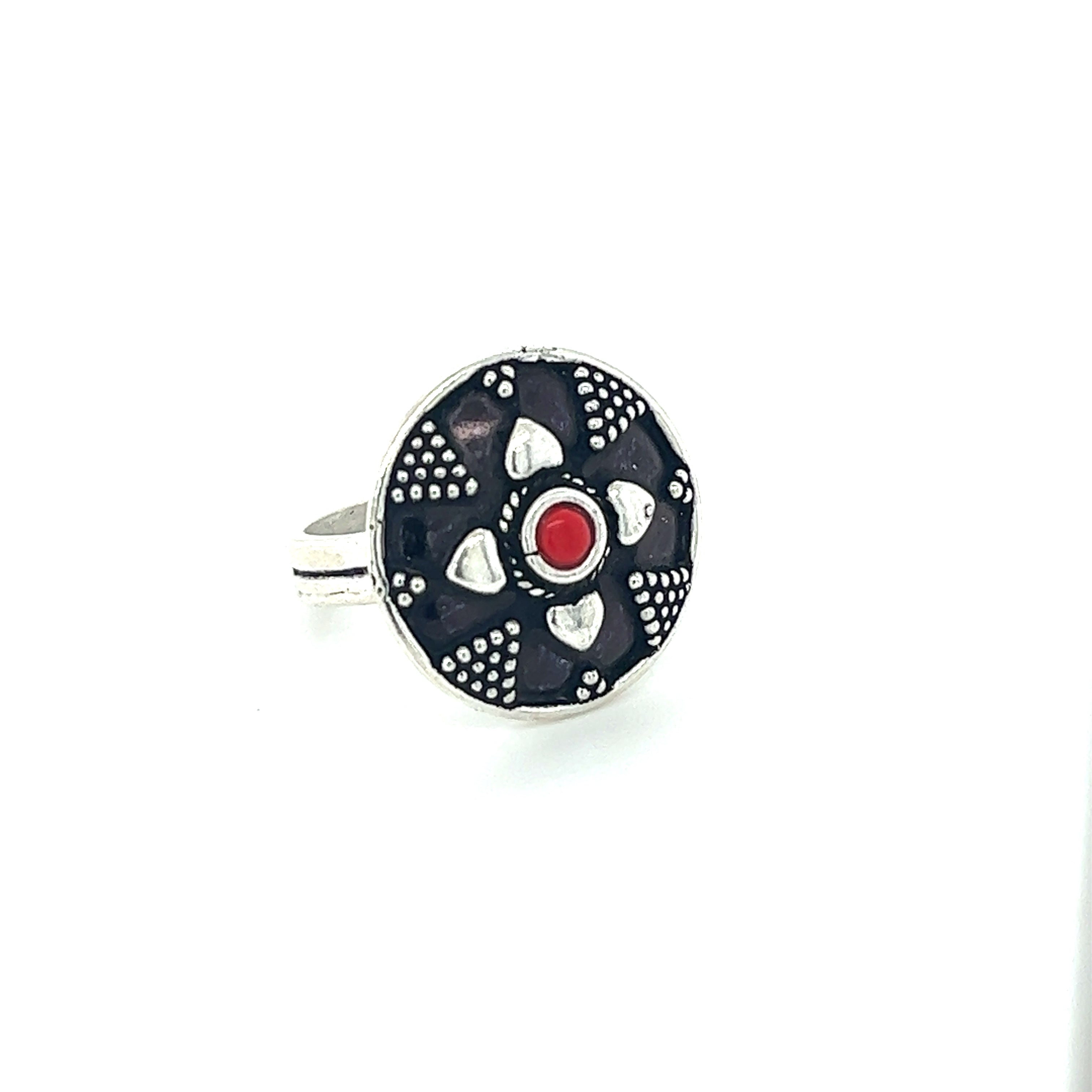 A stunning Tibetan-Style Rings with Small Stones with a red stone.