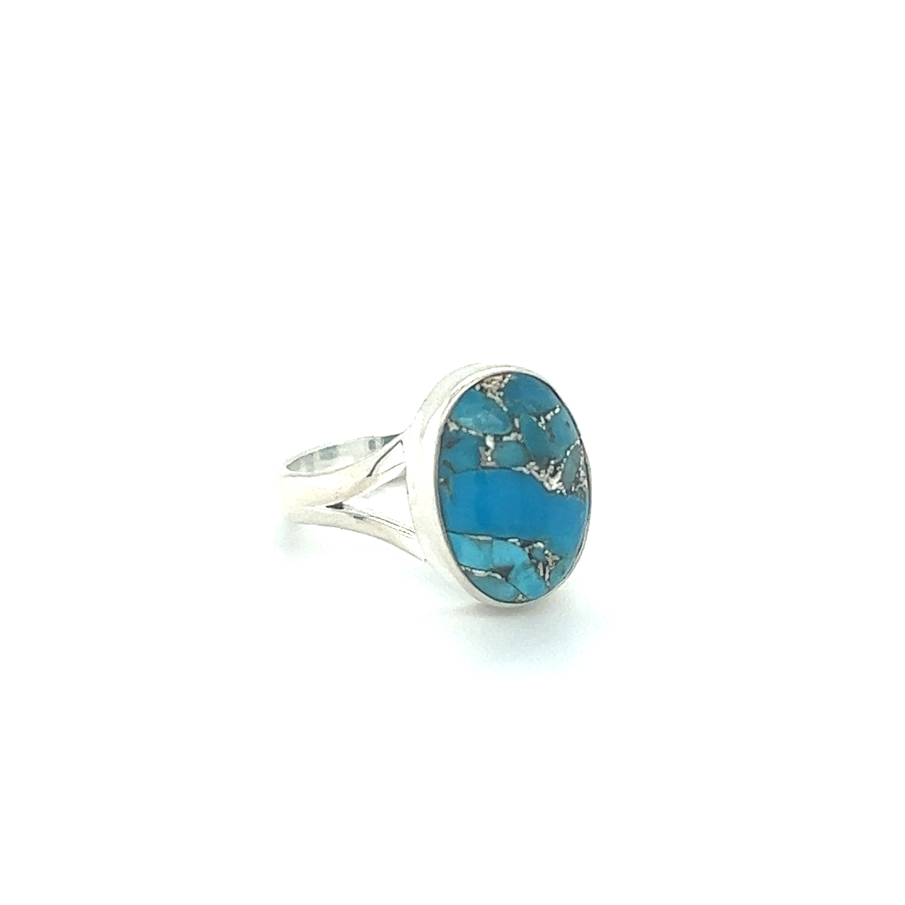An elegant oval turquoise Oval Stone Ring on a white background showcasing its natural beauty.