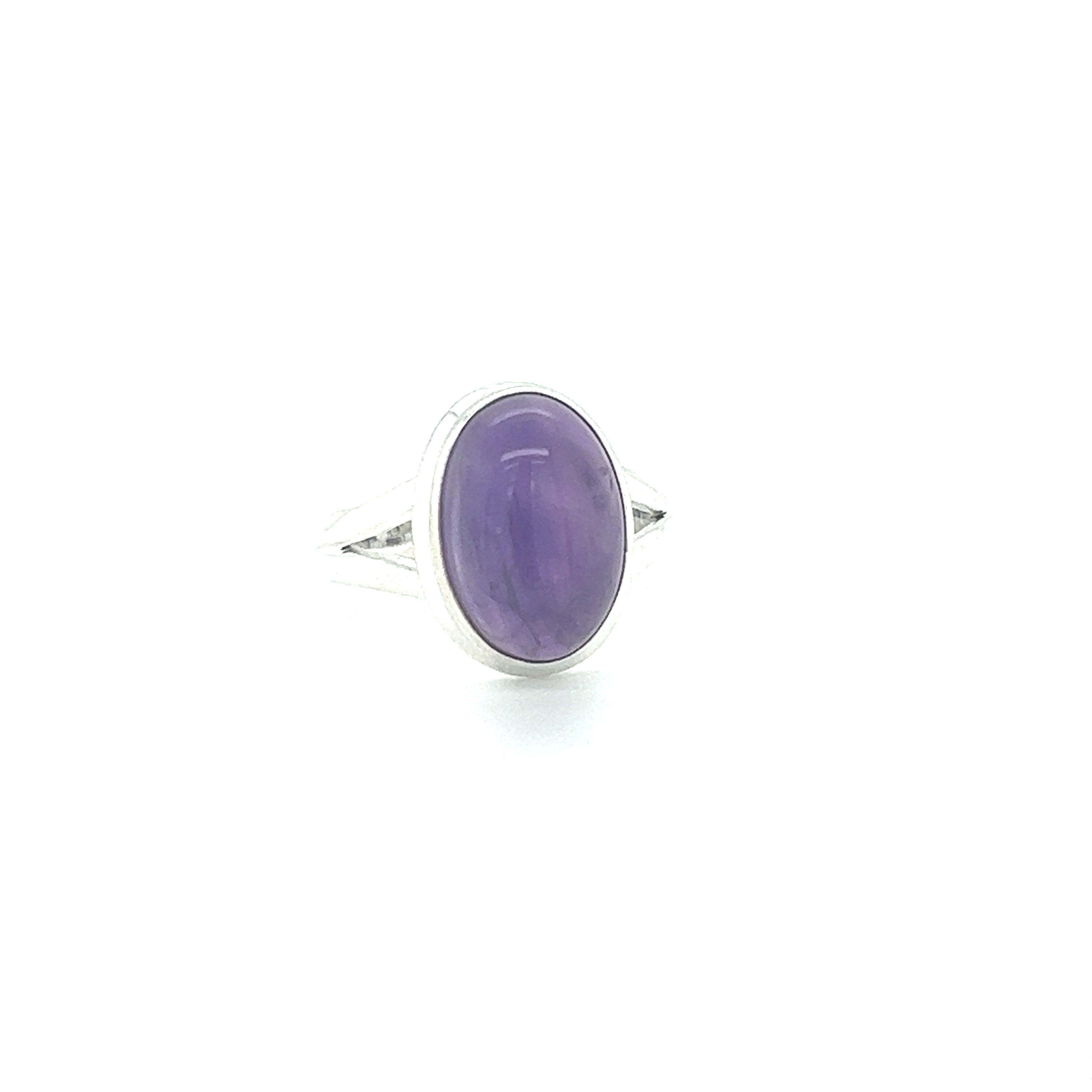 A sterling silver oval stone ring on a white background.