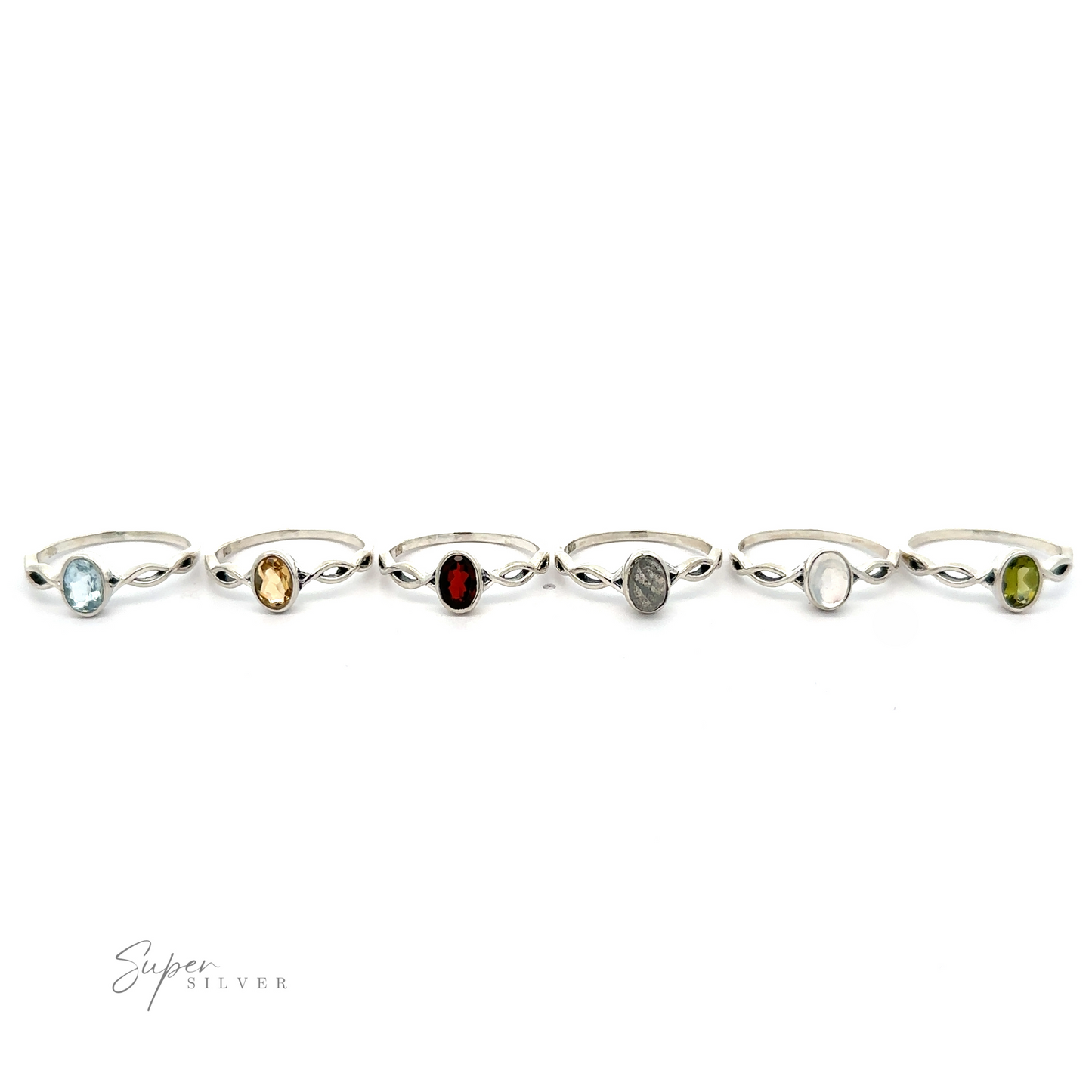A line of seven Dainty Oval Gemstone Rings with Twisted Bands, featuring sparkling oval gemstones, isolated on a white background.