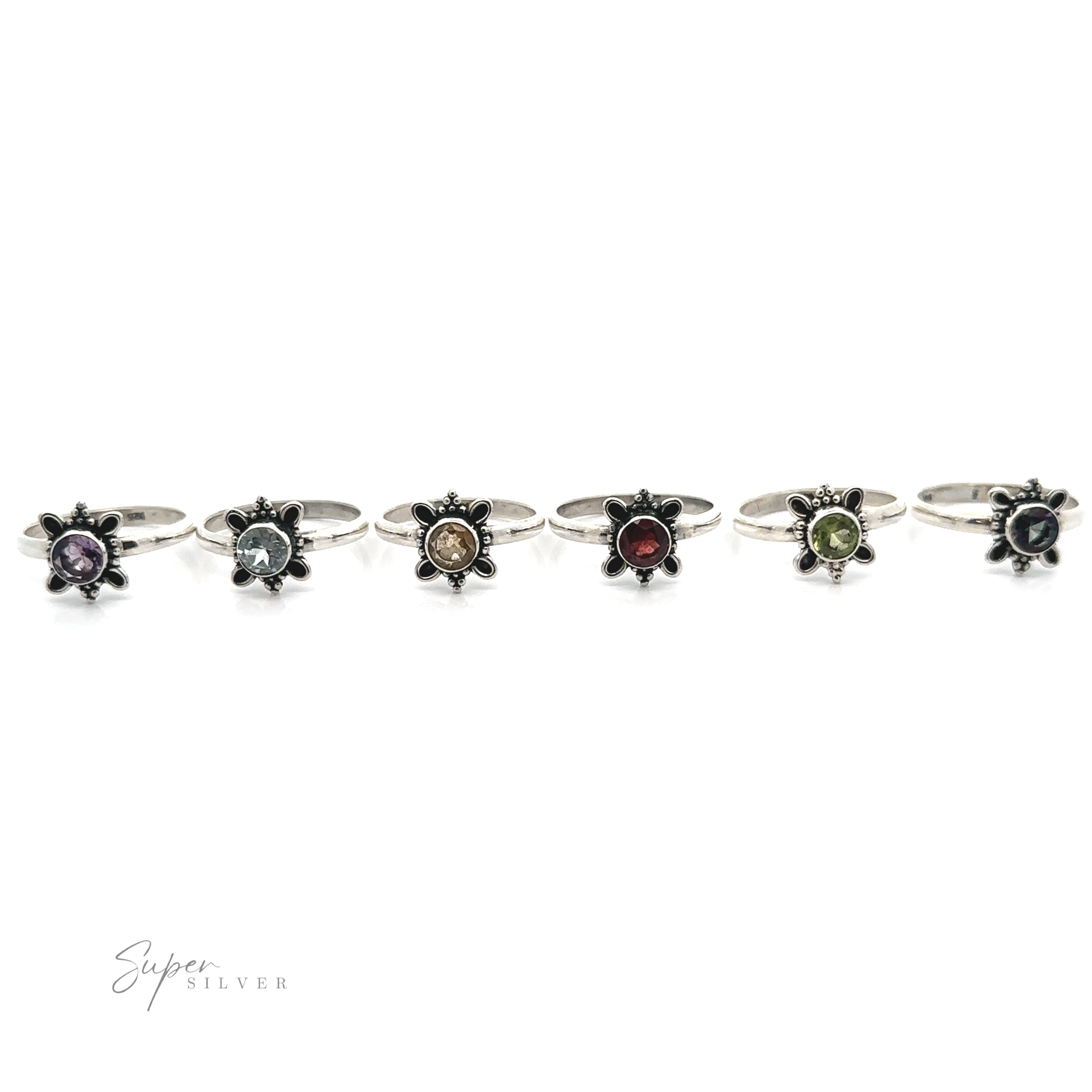 A collection of sterling silver Round Faceted Gemstone Rings with various colored gemstones displayed in a row on a white background.