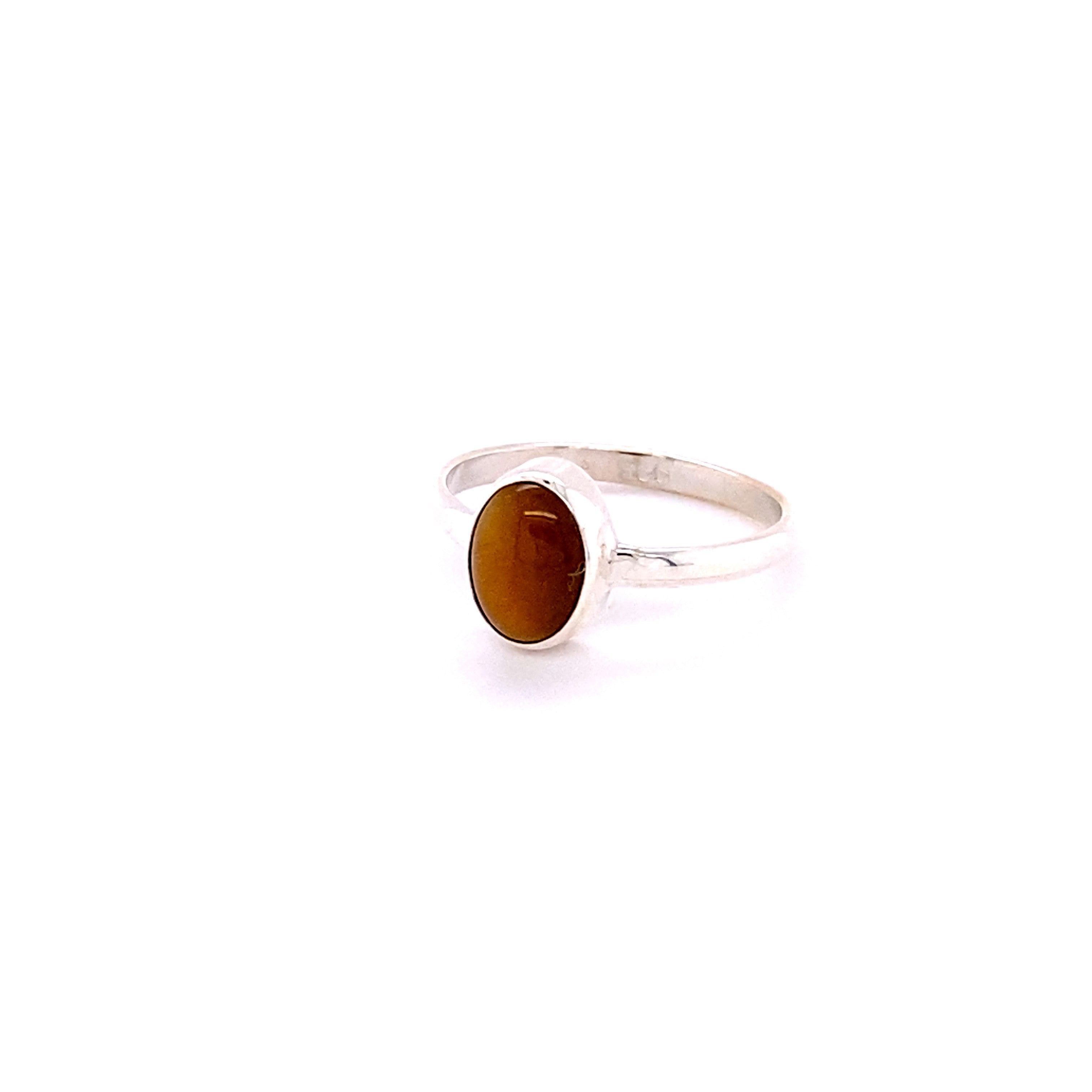 Simple Oval Natural Gemstone Ring with an oval amber stone set in a simple bezel, displayed against a white background.