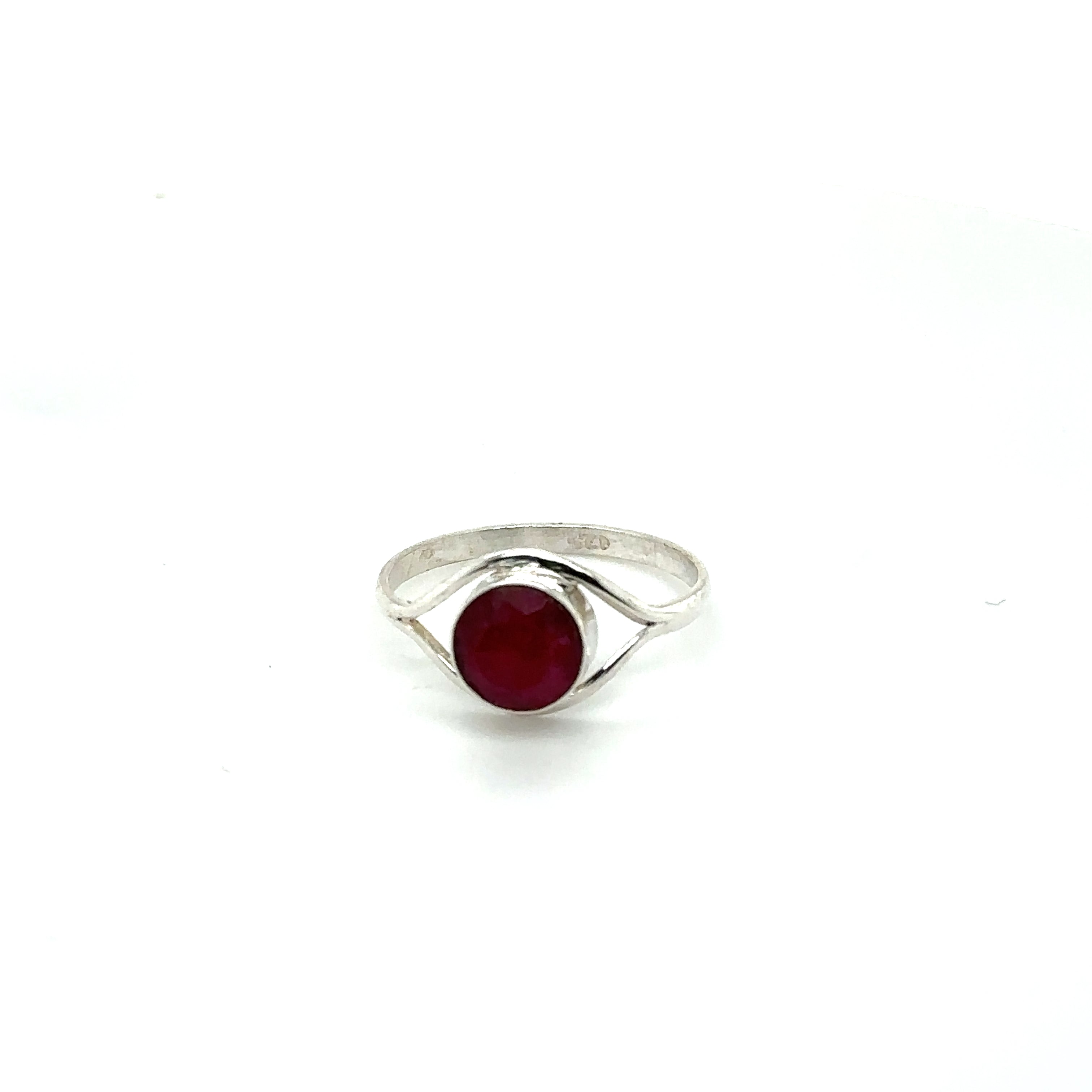A contemporary Abstract Stone Eye ring with a ruby gemstone.