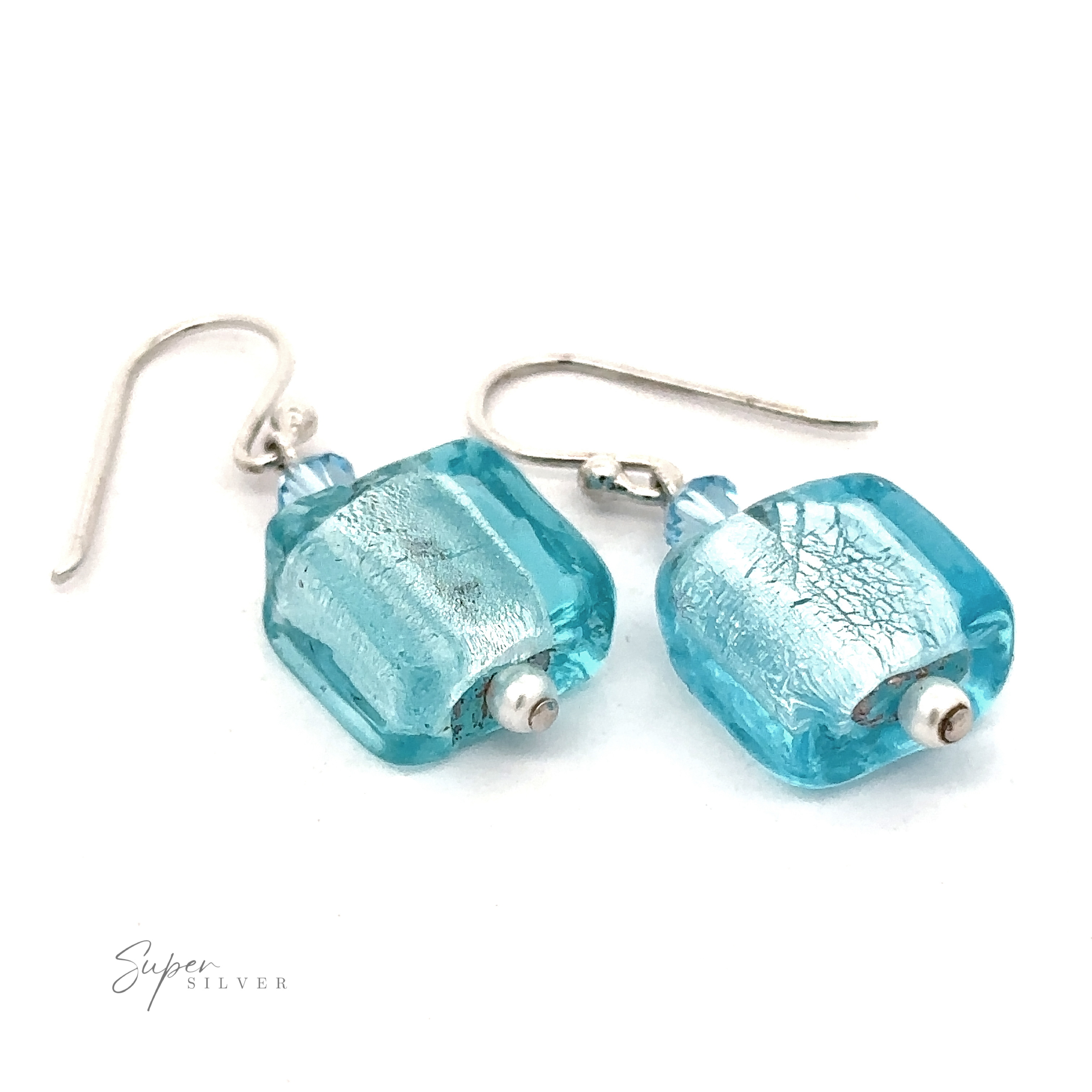 A pair of Beaded Resin Earrings with Small Pearls placed on a white background. The earrings have a textured appearance and are linked to the hooks with small silver beads, showcasing a classic design that adds a timeless elegance to any outfit.