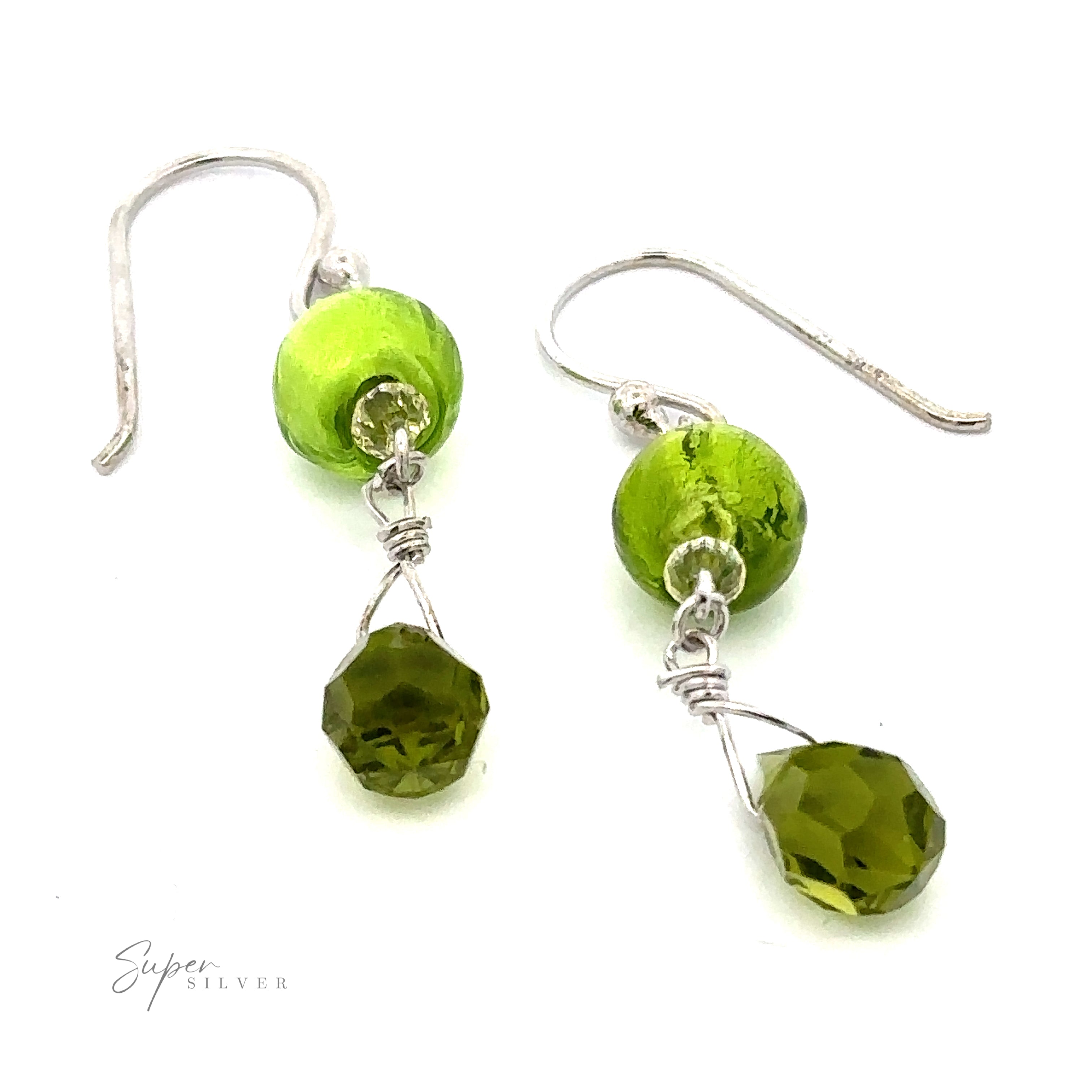 A pair of Dangly Green Beaded Earrings with green spherical beads and faceted teardrop-shaped pendants. These exquisite green dangly earrings bear the brand name "Super Silver" in the corner.