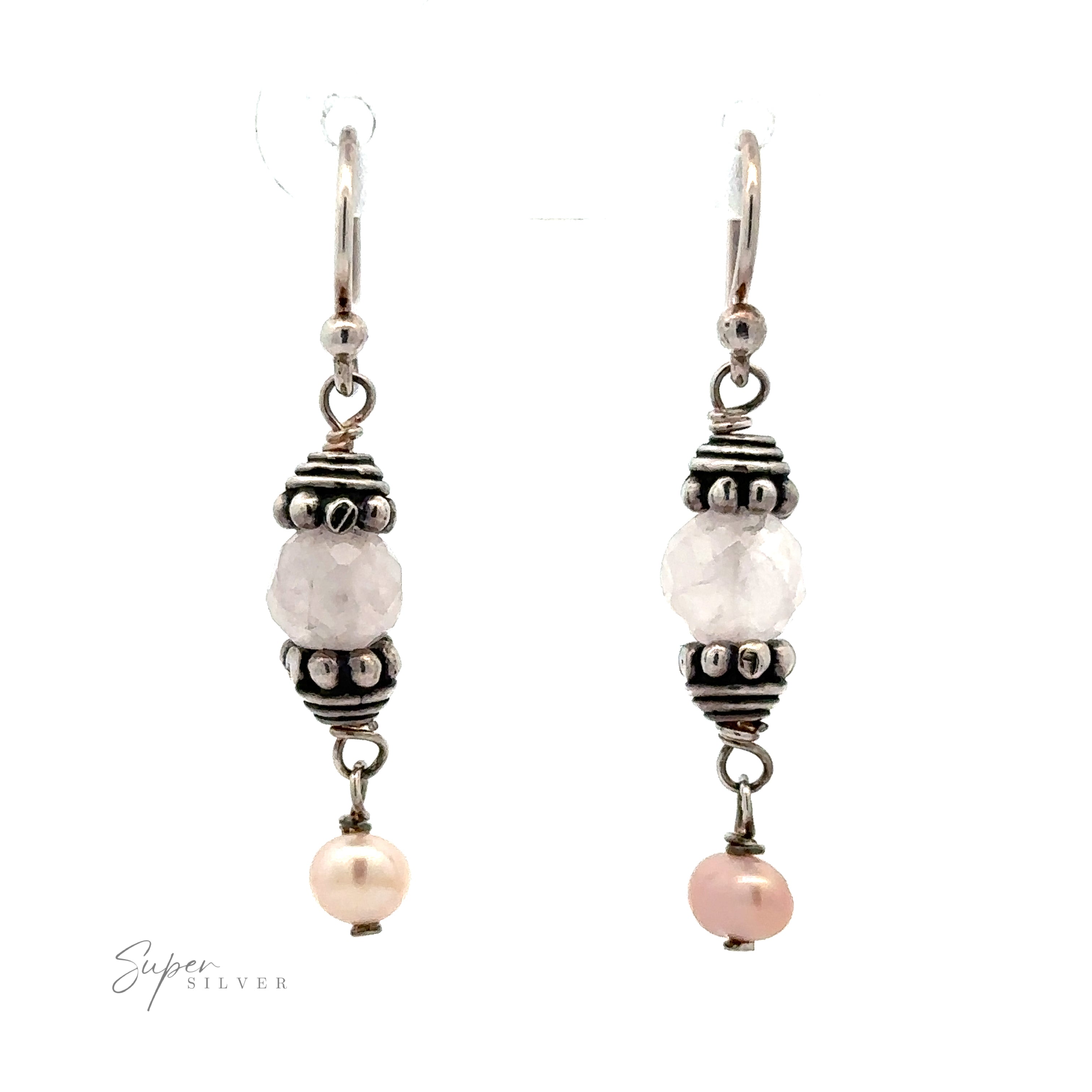 A pair of Beaded Pink and Pearl Earrings featuring a central white bead with decorative Sterling Silver accents and a faceted pink pearl at the bottom. The earrings are displayed against a white background.