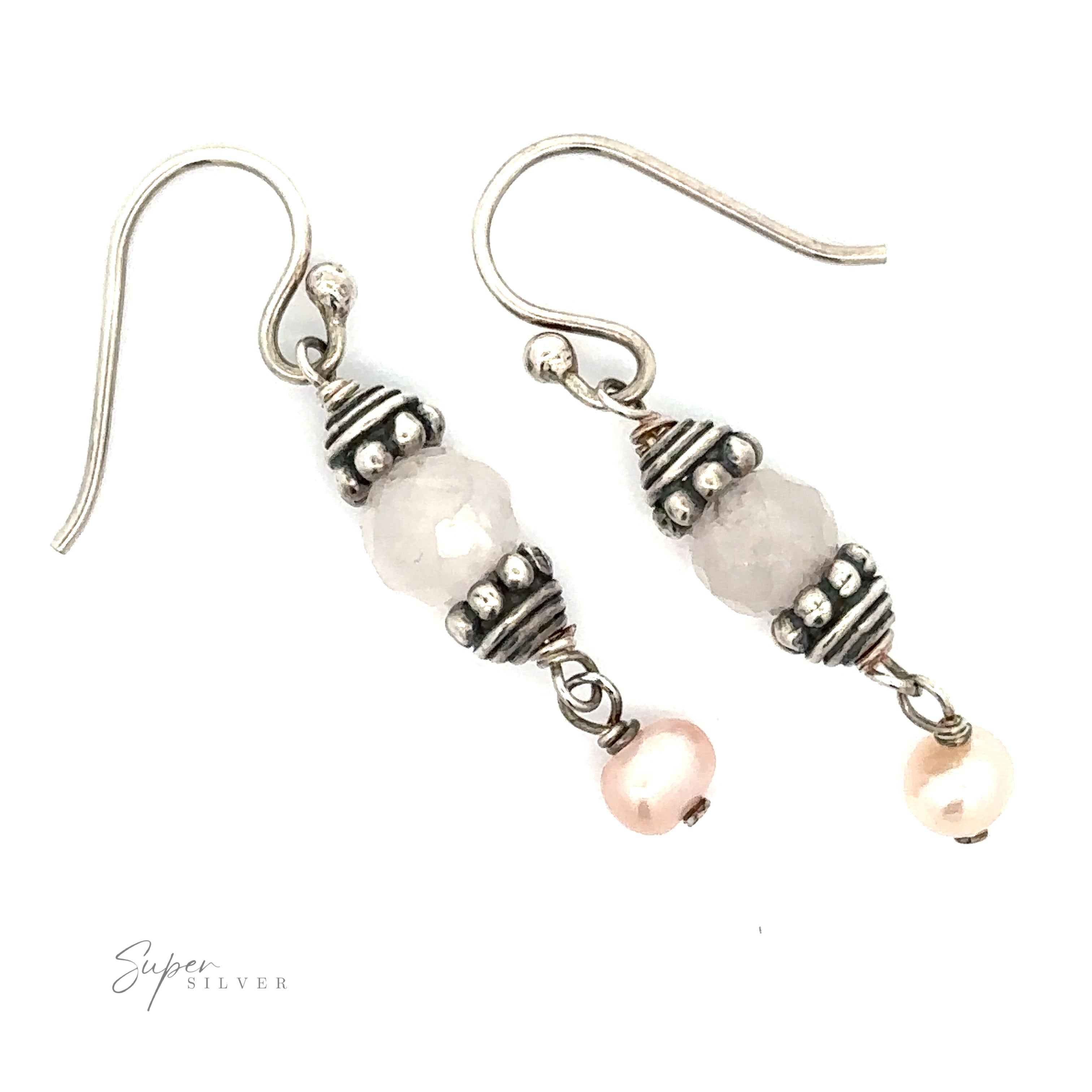 A pair of Beaded Pink and Pearl Earrings. Each earring features a faceted bead with metallic accents and a small pink pearl at the bottom.