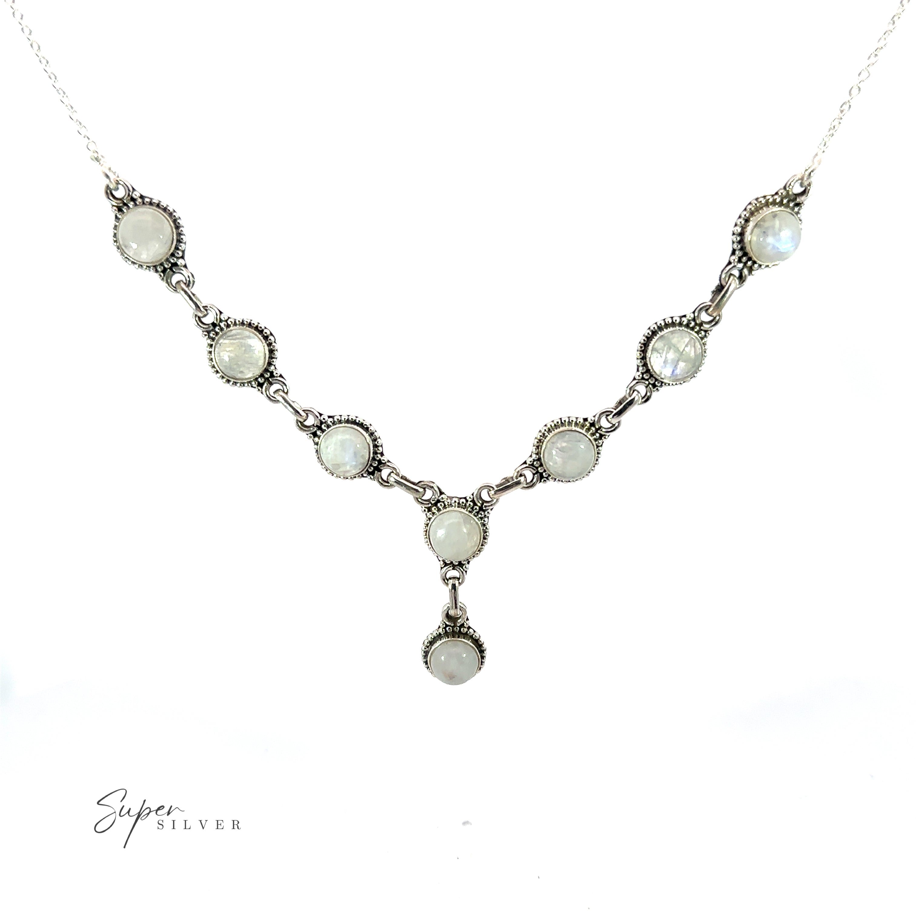 A delicate Round Gemstone Y Necklace with Ball Border featuring round, opaque stones arranged in a V-shape, with a small pendant at the center. This bohemian style jewelry piece showcases the brand name "Super Silver" elegantly written in the bottom left corner.