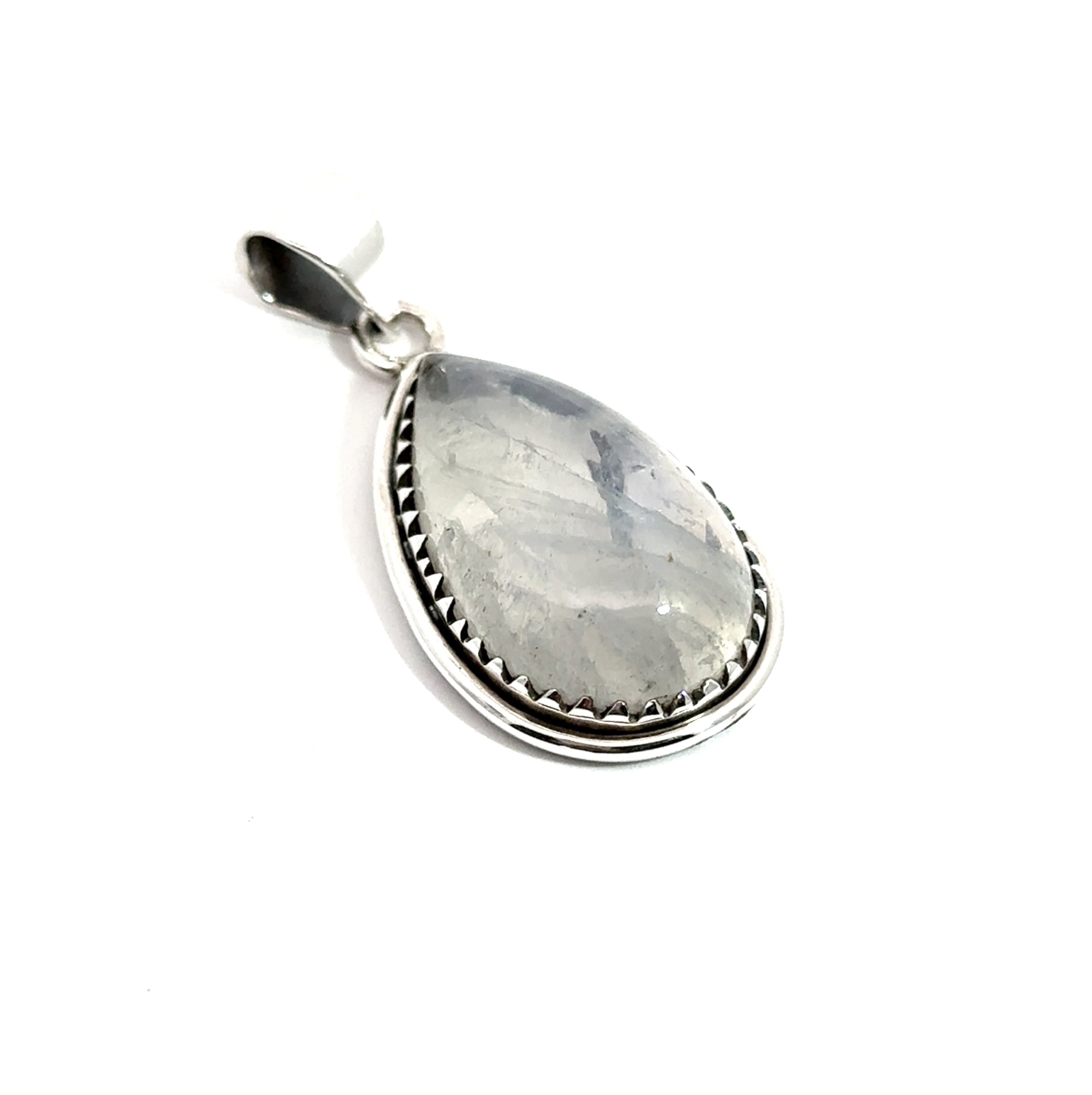 The Teardrop Moonstone Pendant features a teardrop-shaped moonstone set in sterling silver with boho detailing along the edge and a loop for necklace attachment.