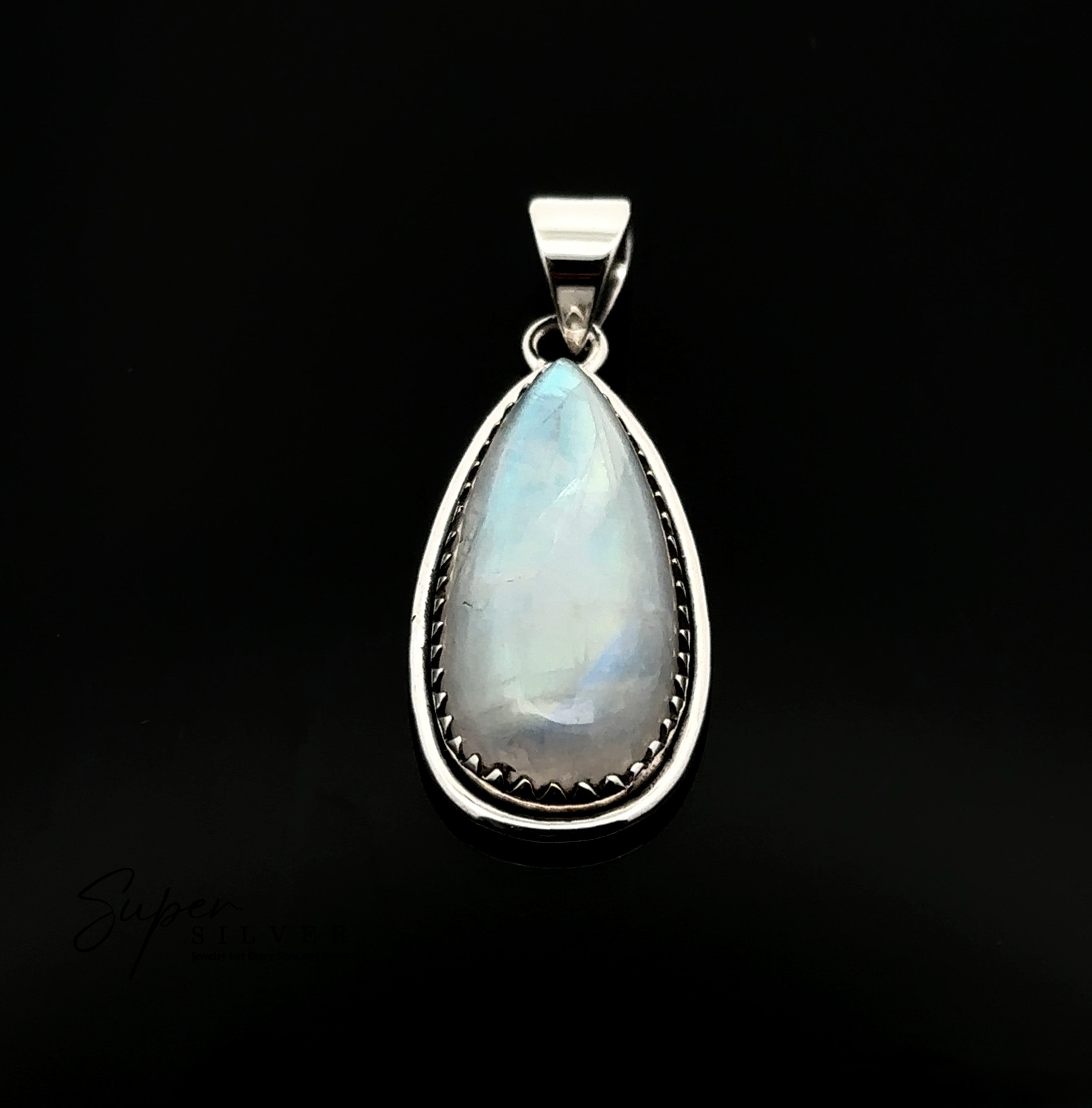 The Teardrop Moonstone Pendant features a teardrop-shaped moonstone set in a sterling silver bezel with boho details and a scalloped edge, shown against a black background.